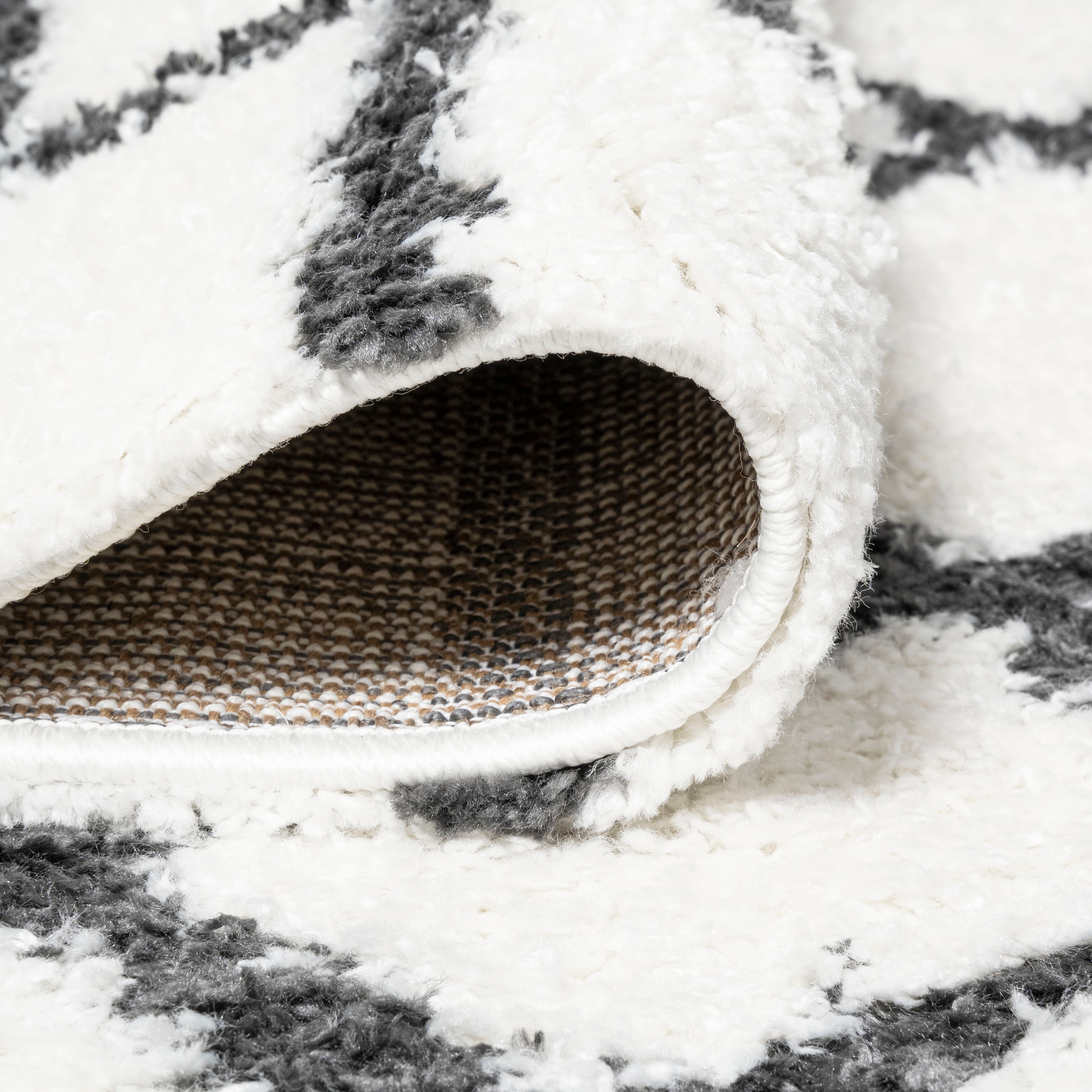 Ivory and Black Moroccan-Inspired Geometric Shag Rug