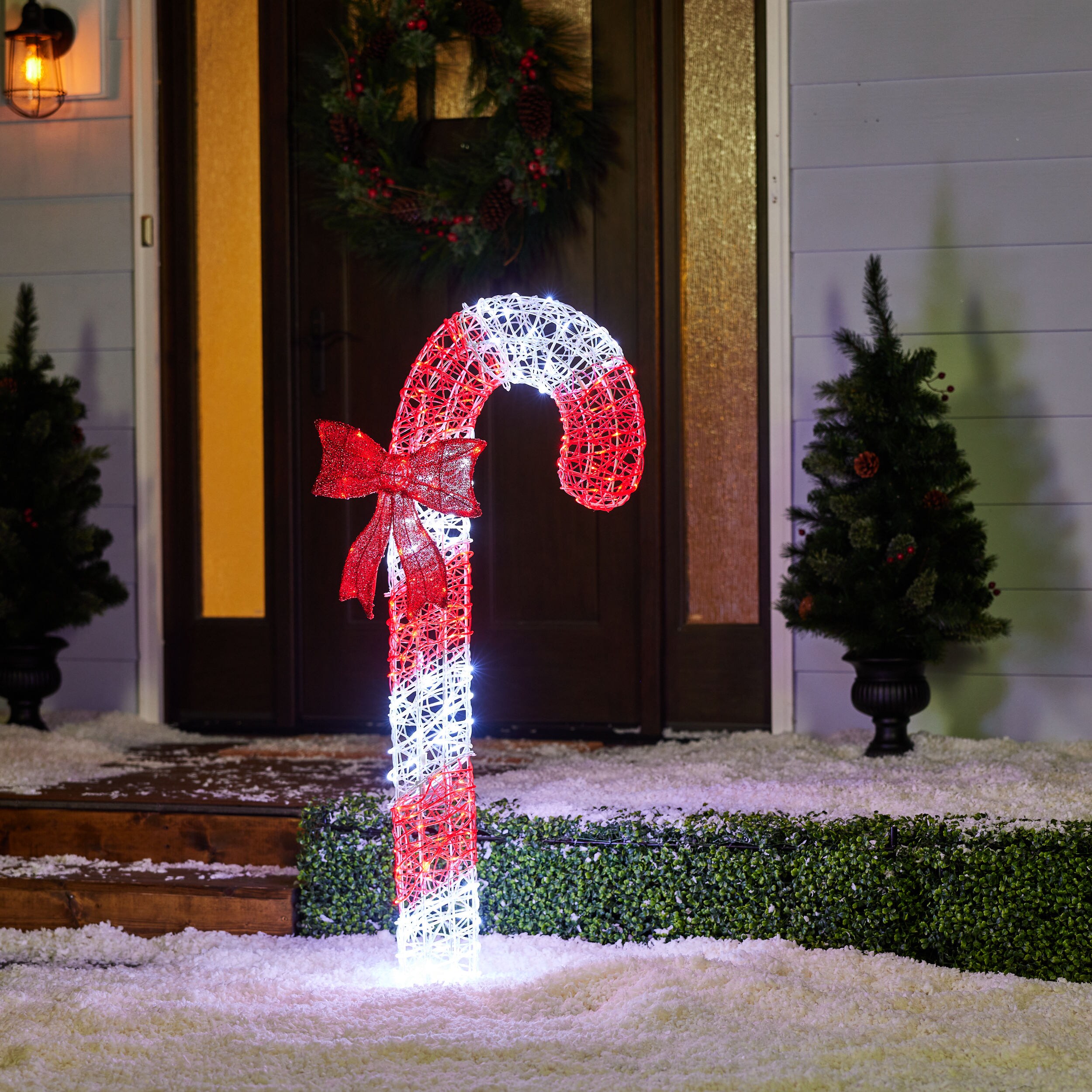 Holiday Living 4-ft LED Microdot Twinkling Candy Cane Yard Decoration at Lowes.com