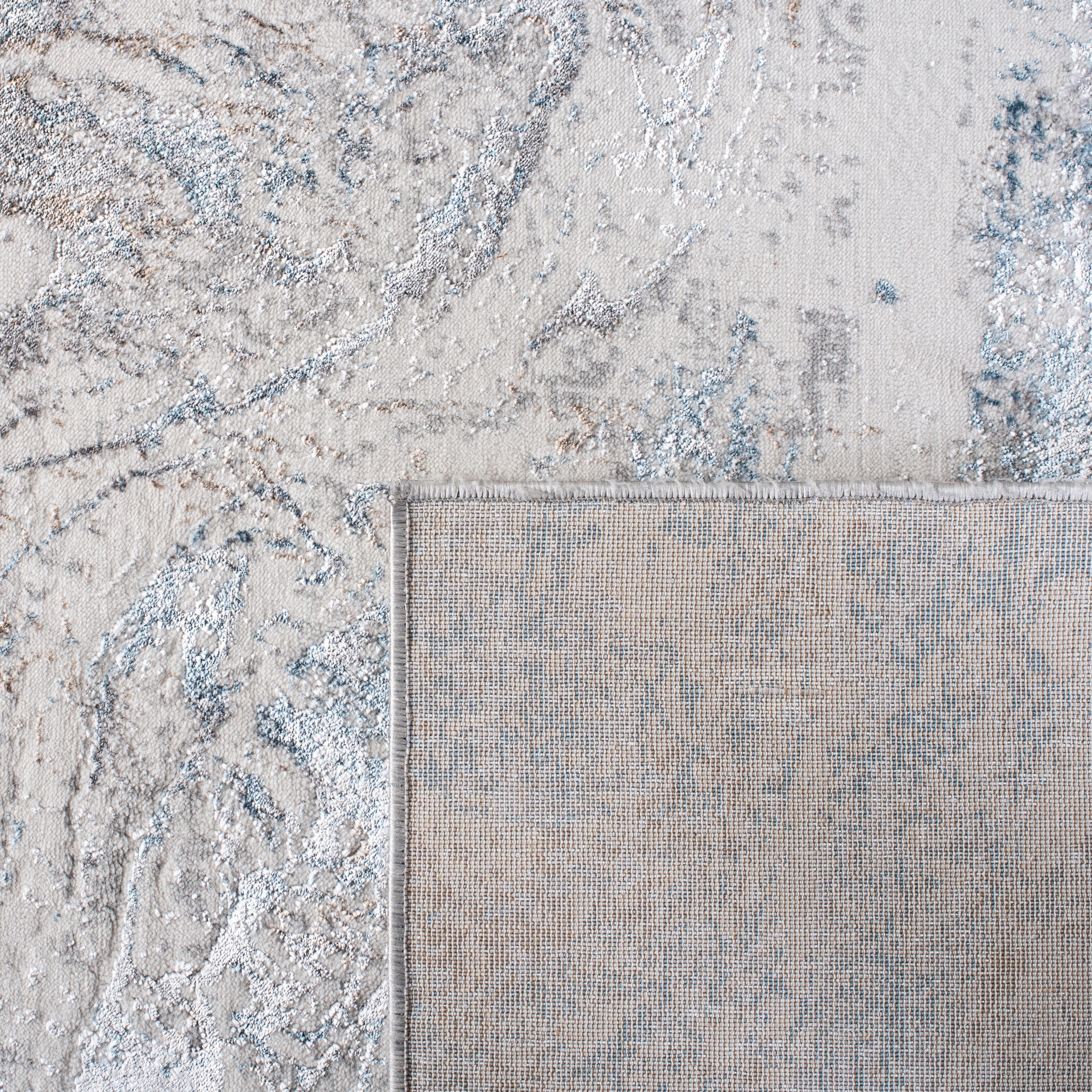 Ivory Abstract 9' x 12' Synthetic Easy Care Area Rug