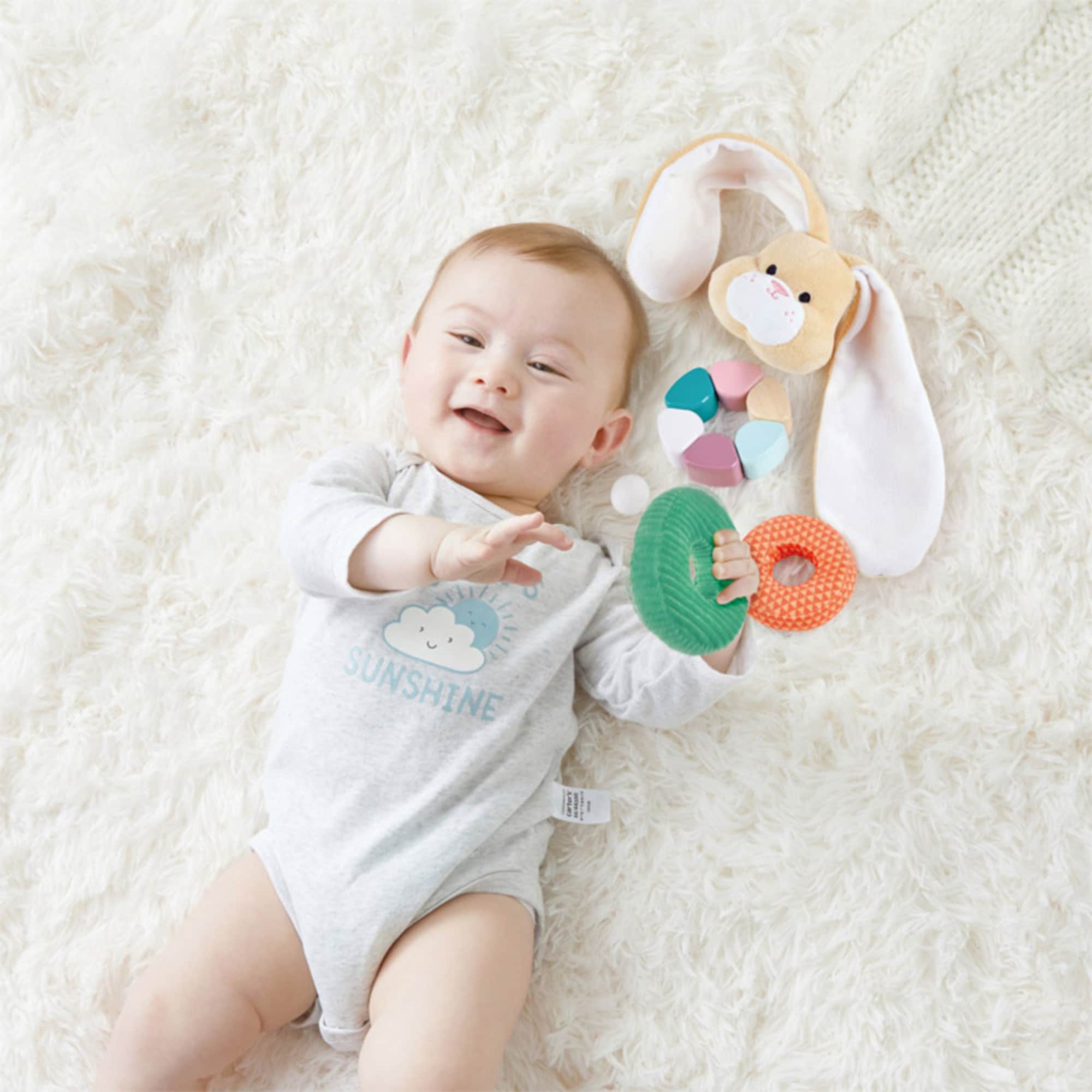 Hape Bunny Wooden Ring Stacker with Multi-Textured Rings