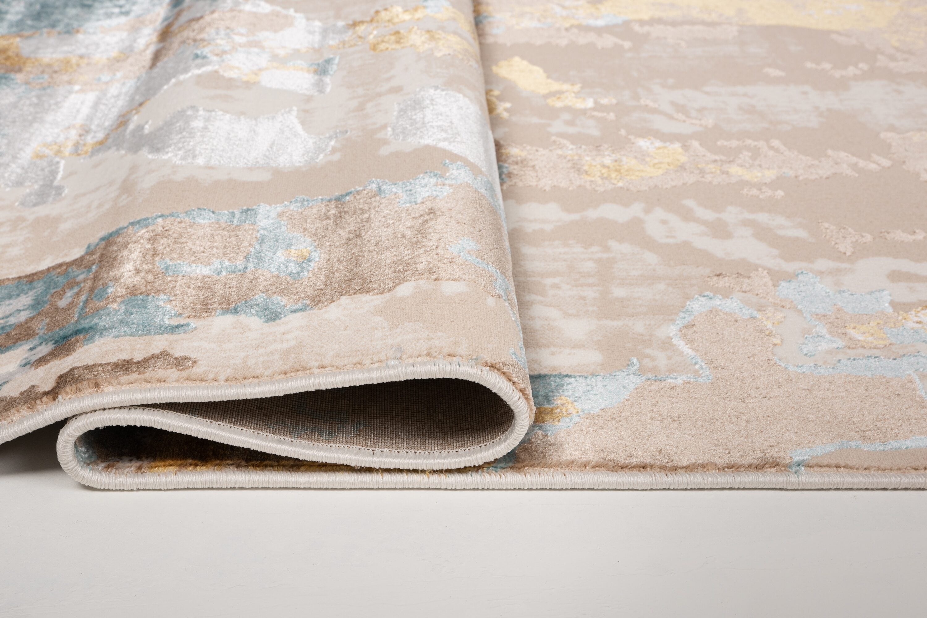 London Collection Cream and Brown Abstract Area Rug