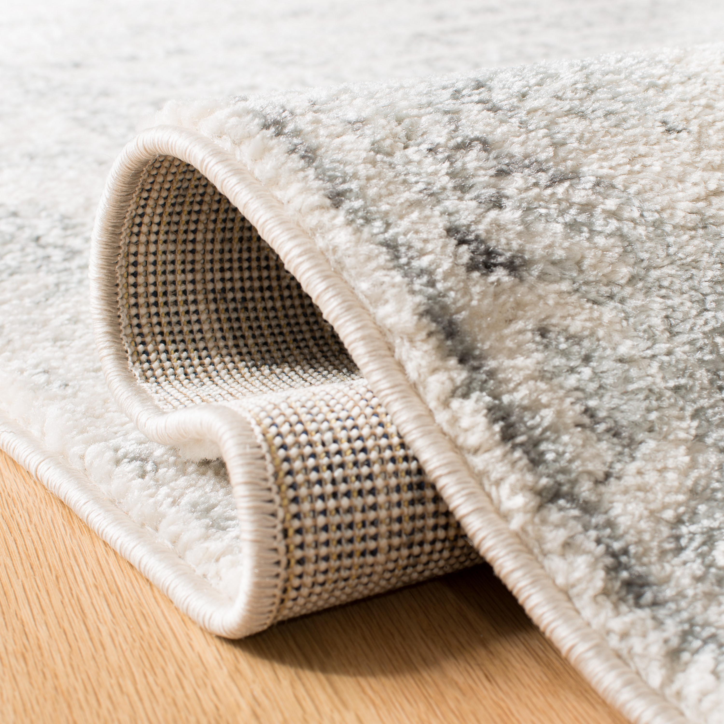 Ivory and Grey Synthetic 2' x 5' Hand-Knotted Easy Care Runner Rug