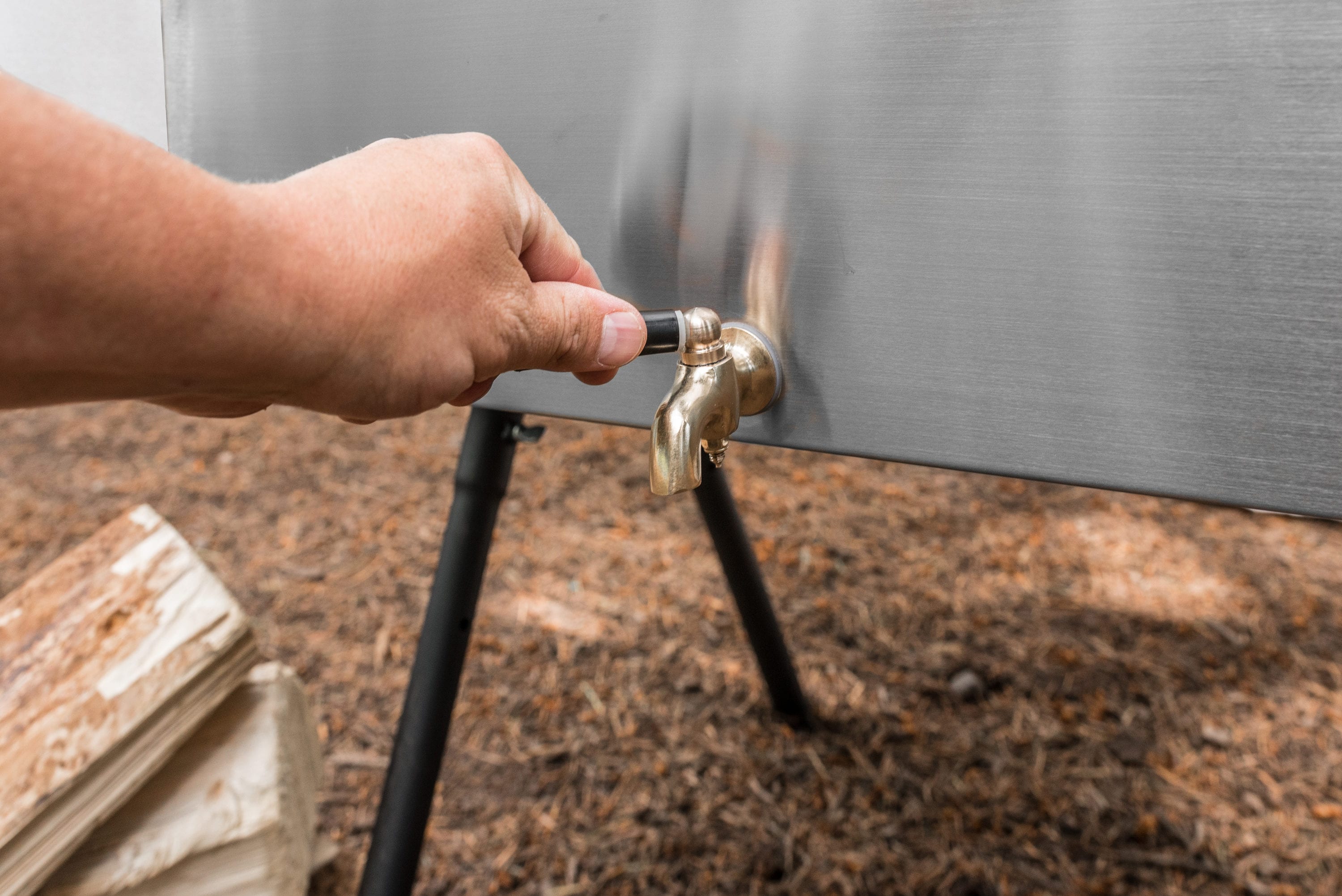 Camp Chef Aluminum Hot Water Pot with Dispenser in the Grill