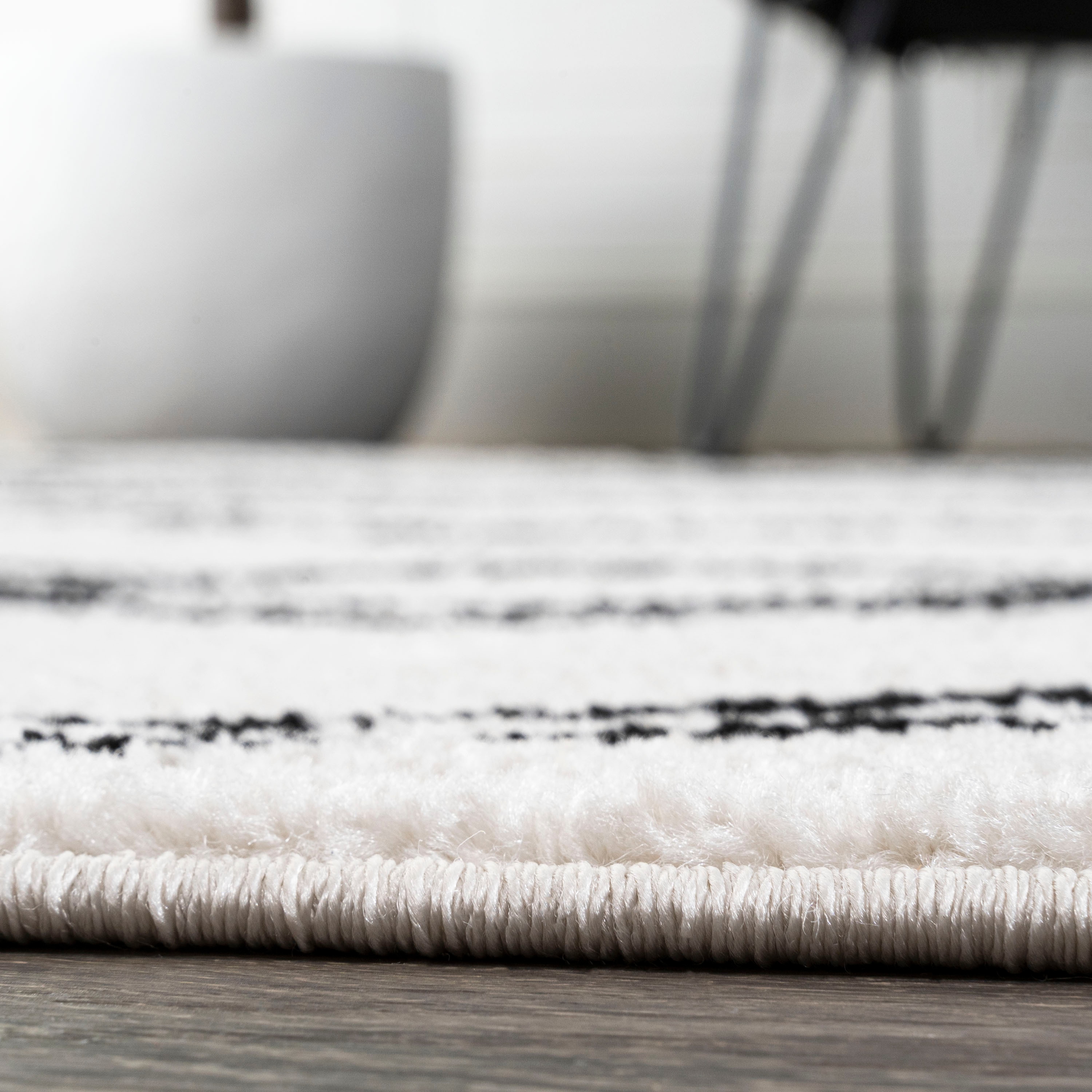 Deia Black and White Geometric Shag Area Rug