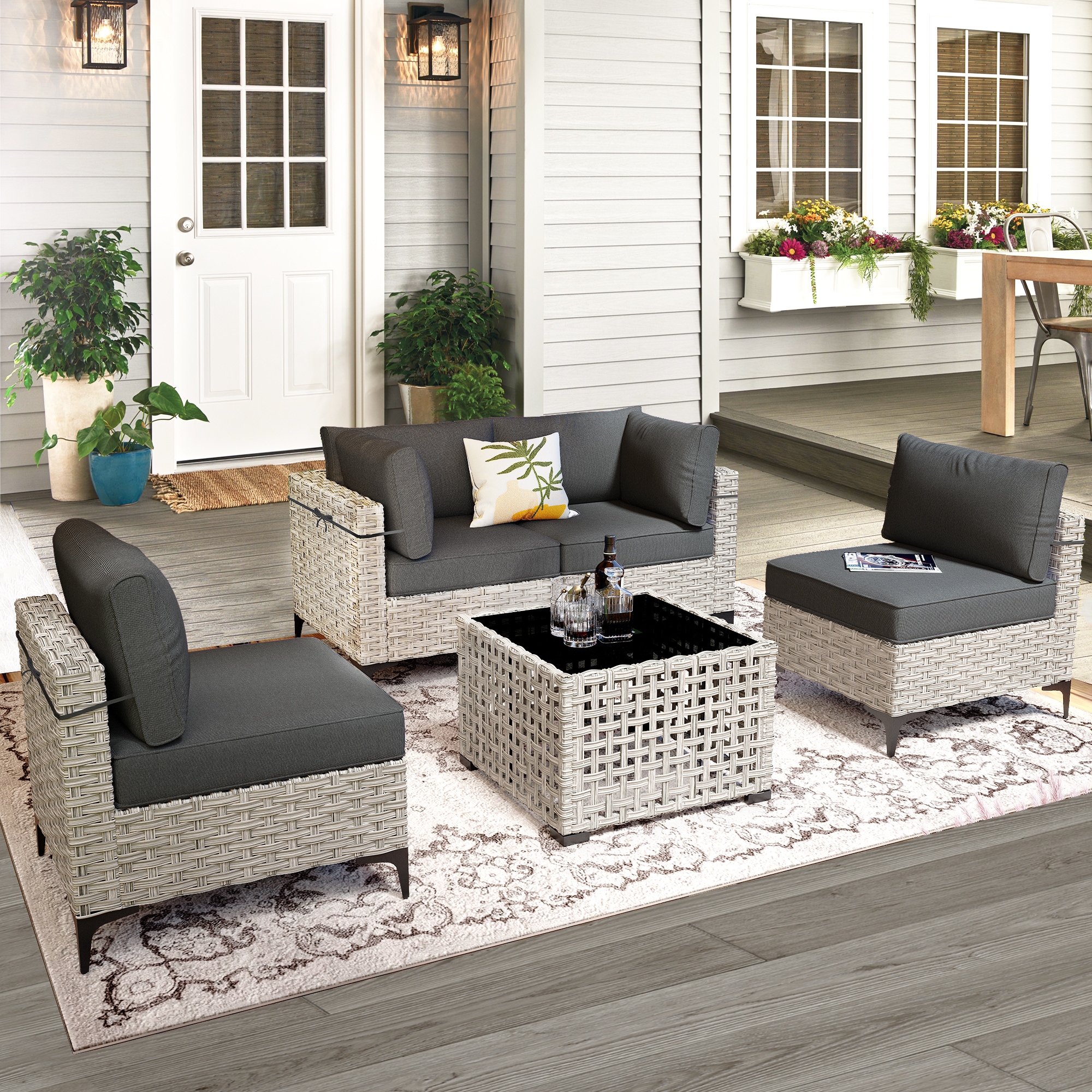 XIZZI XISKT1052 Amber Rattan Outdoor Sectional with Black Cushions and Steel Frame