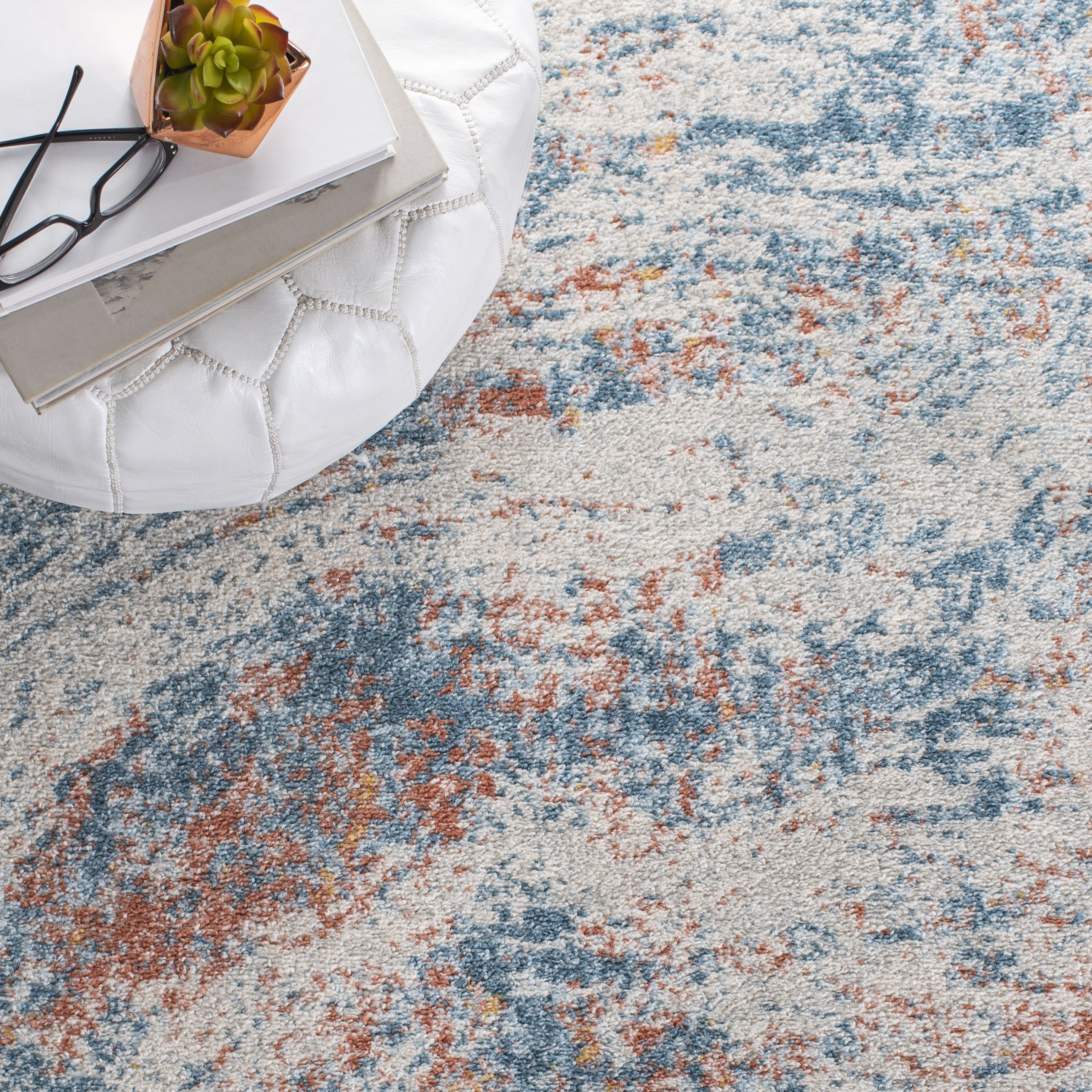 Ivory and Blue Abstract 9' x 12' Stain-Resistant Rug