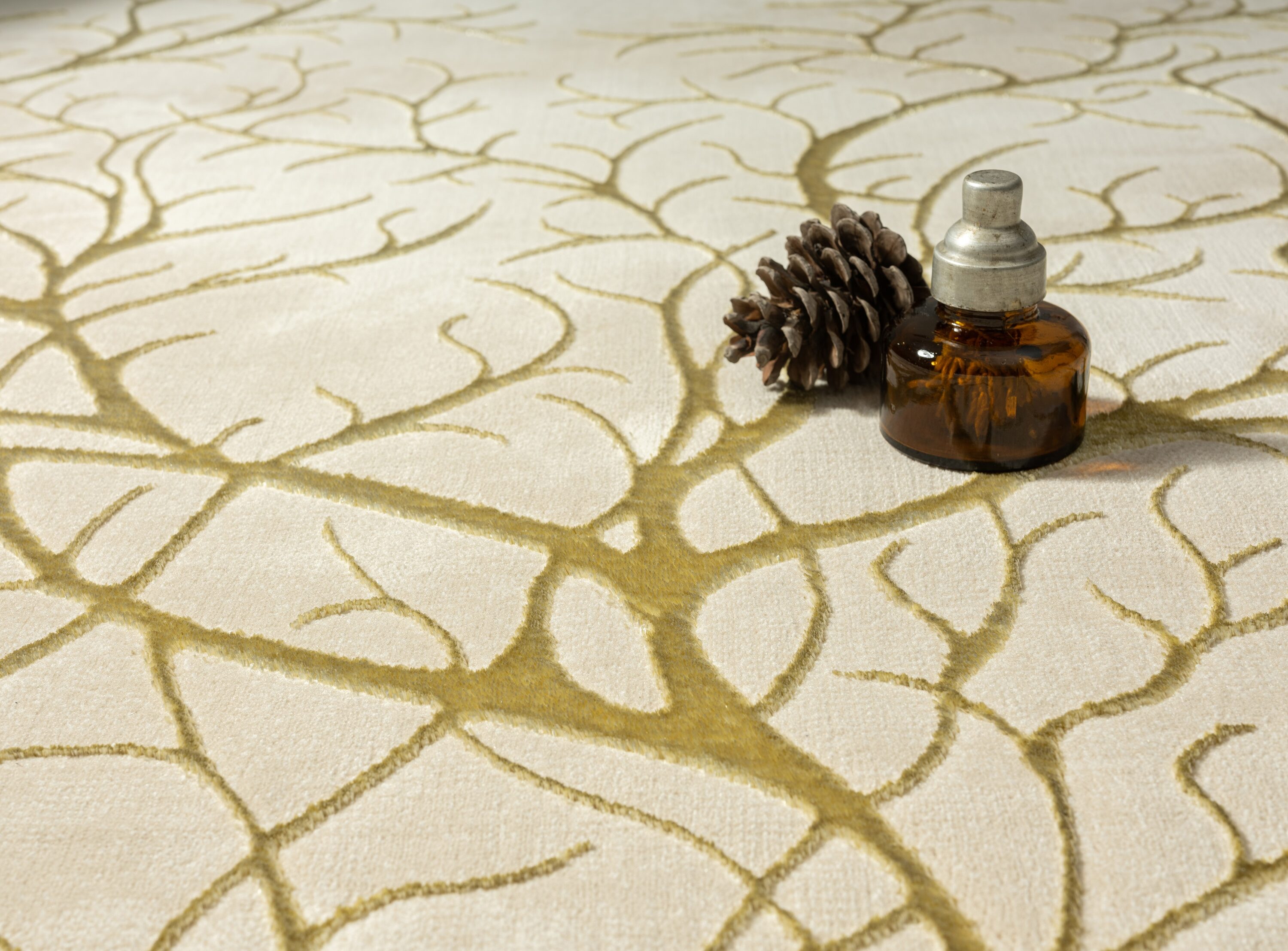 Beige and Gold Abstract Synthetic Area Rug