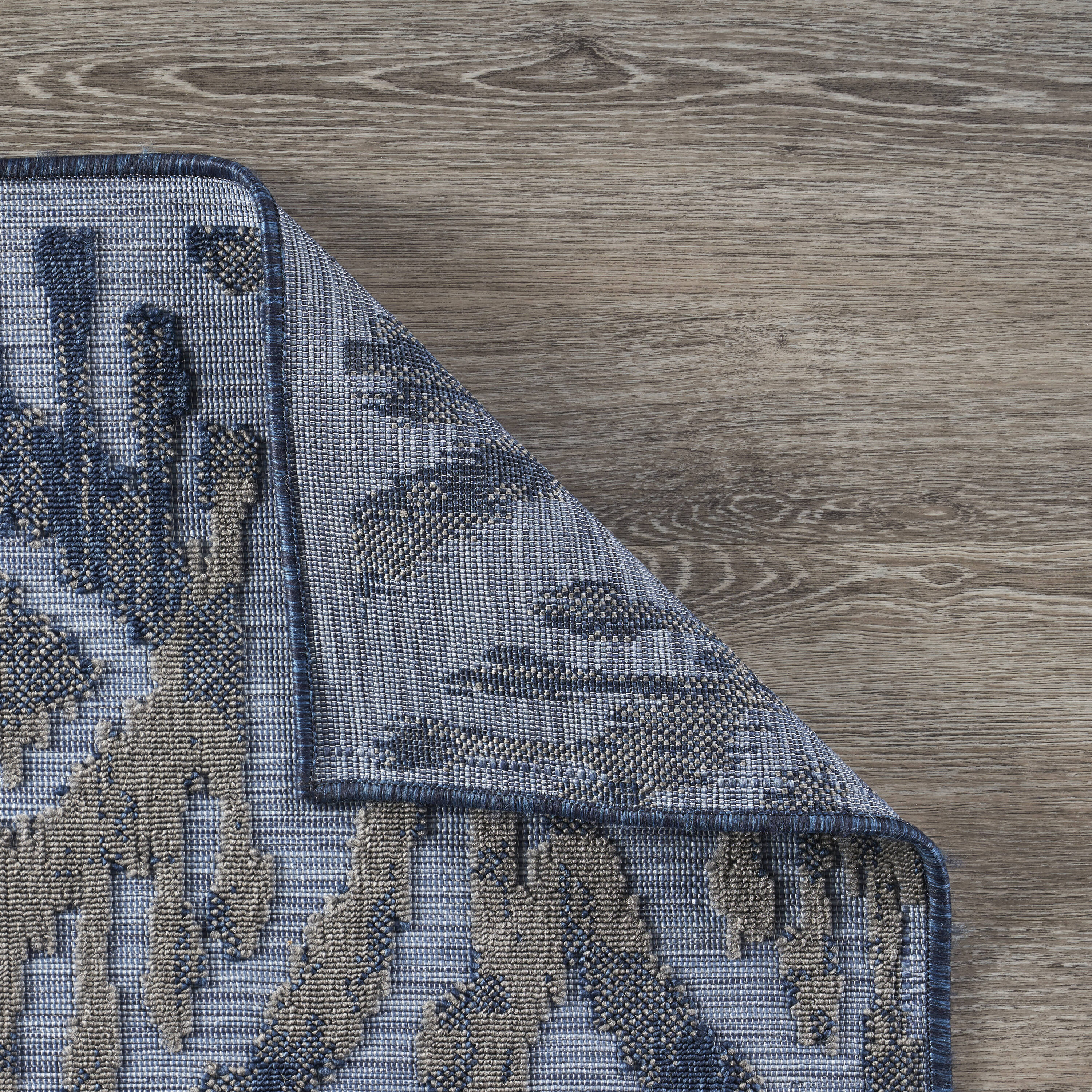Reversible Blue Ikat 5' x 7' Indoor/Outdoor Synthetic Rug