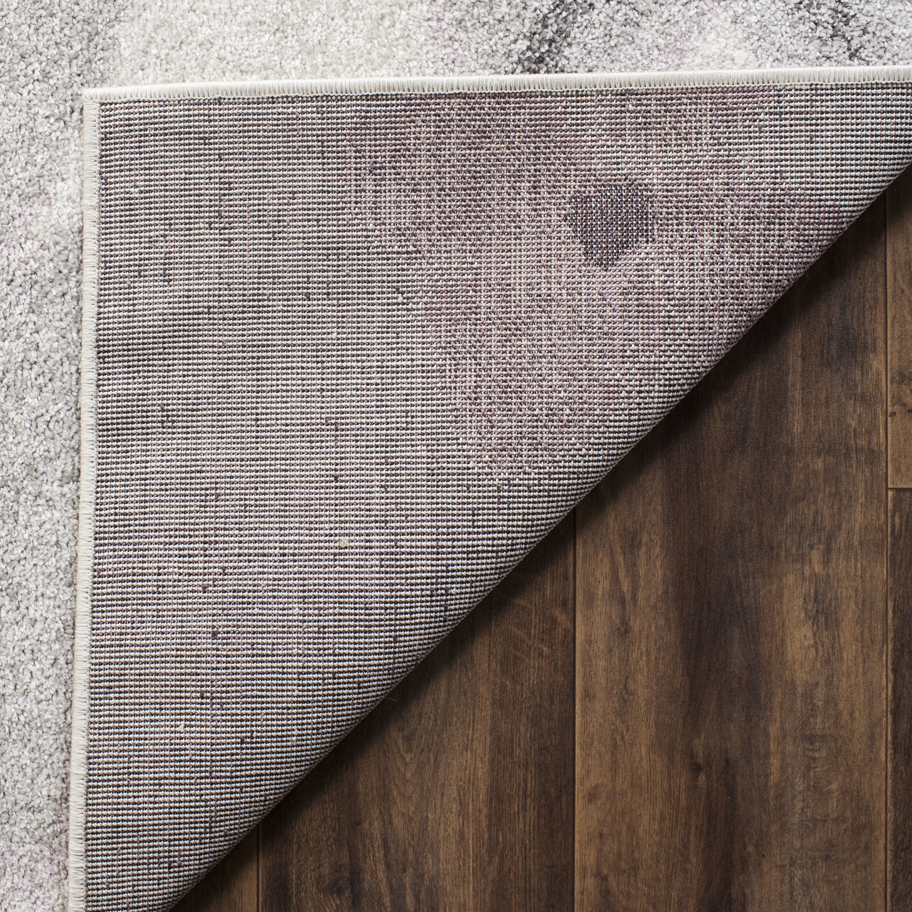 Ivory and Purple Floral Synthetic 5' x 7' Area Rug