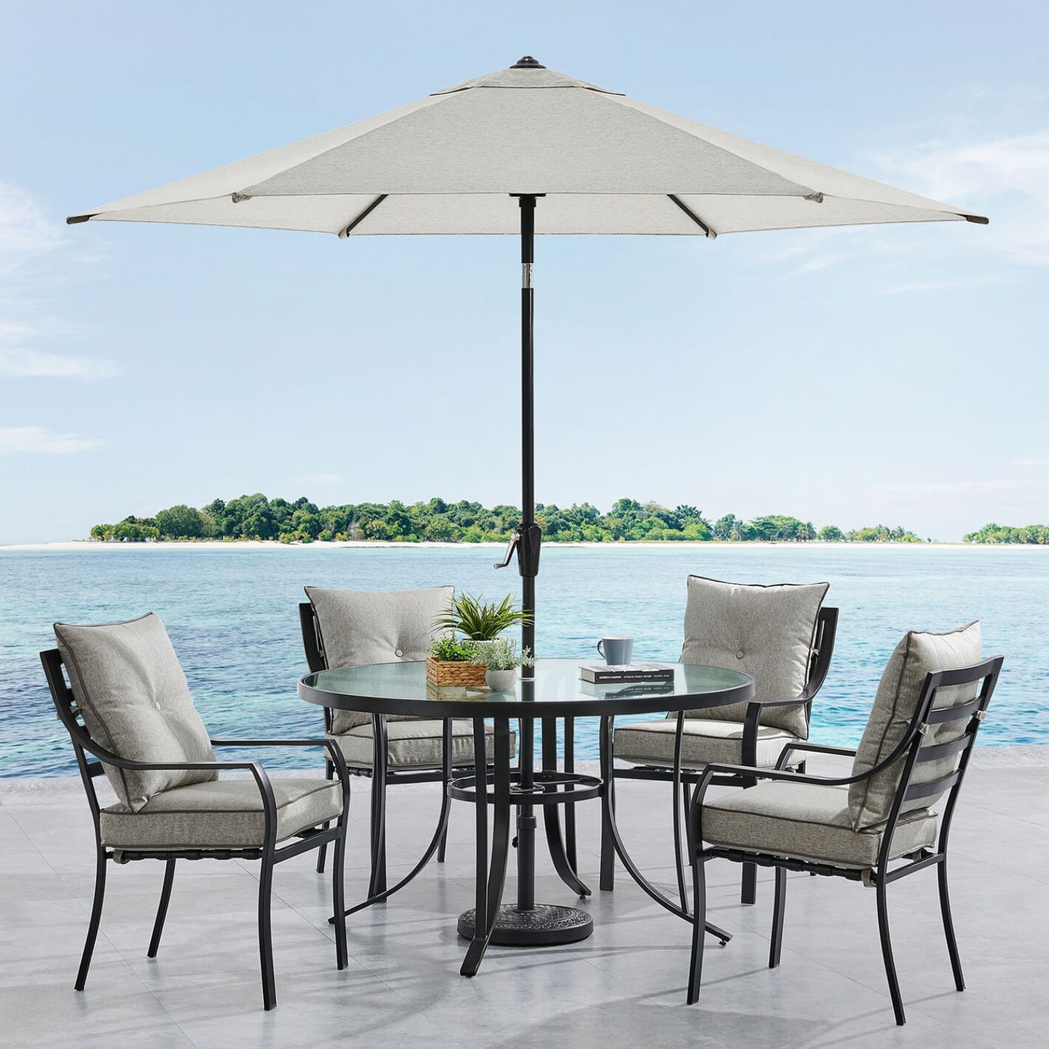 Hanover LAVDN5PCRD-SLV-SU Lavallette 6 -Piece Black Patio Dining Set Aluminum Round Table with 4 Silver Cushions Stationary Chairs and Umbrella Included