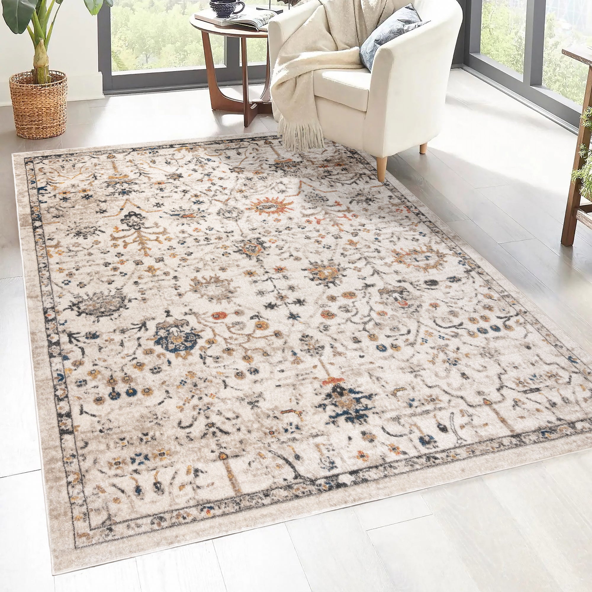 Style Selections 28255 Bending Mountains 5 x 8 (ft) Polypropylene Tan Rectangular Indoor Border Oriental Area rug