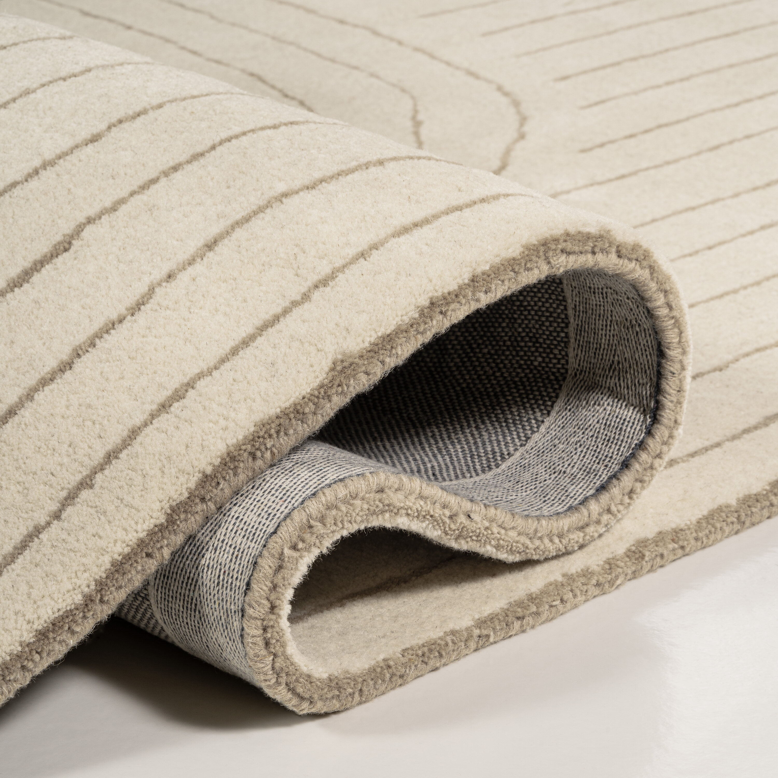 Ivory and Beige Abstract Handwoven Wool Area Rug, 5 ft. x 8 ft.