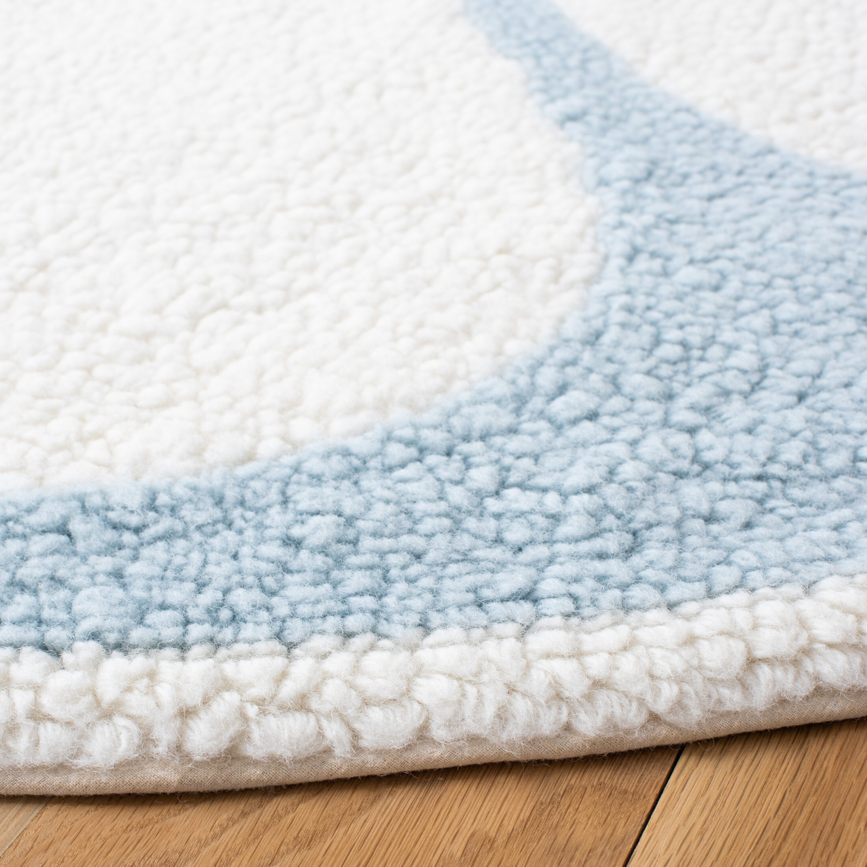Ivory and Light Blue Round Tufted Wool Area Rug