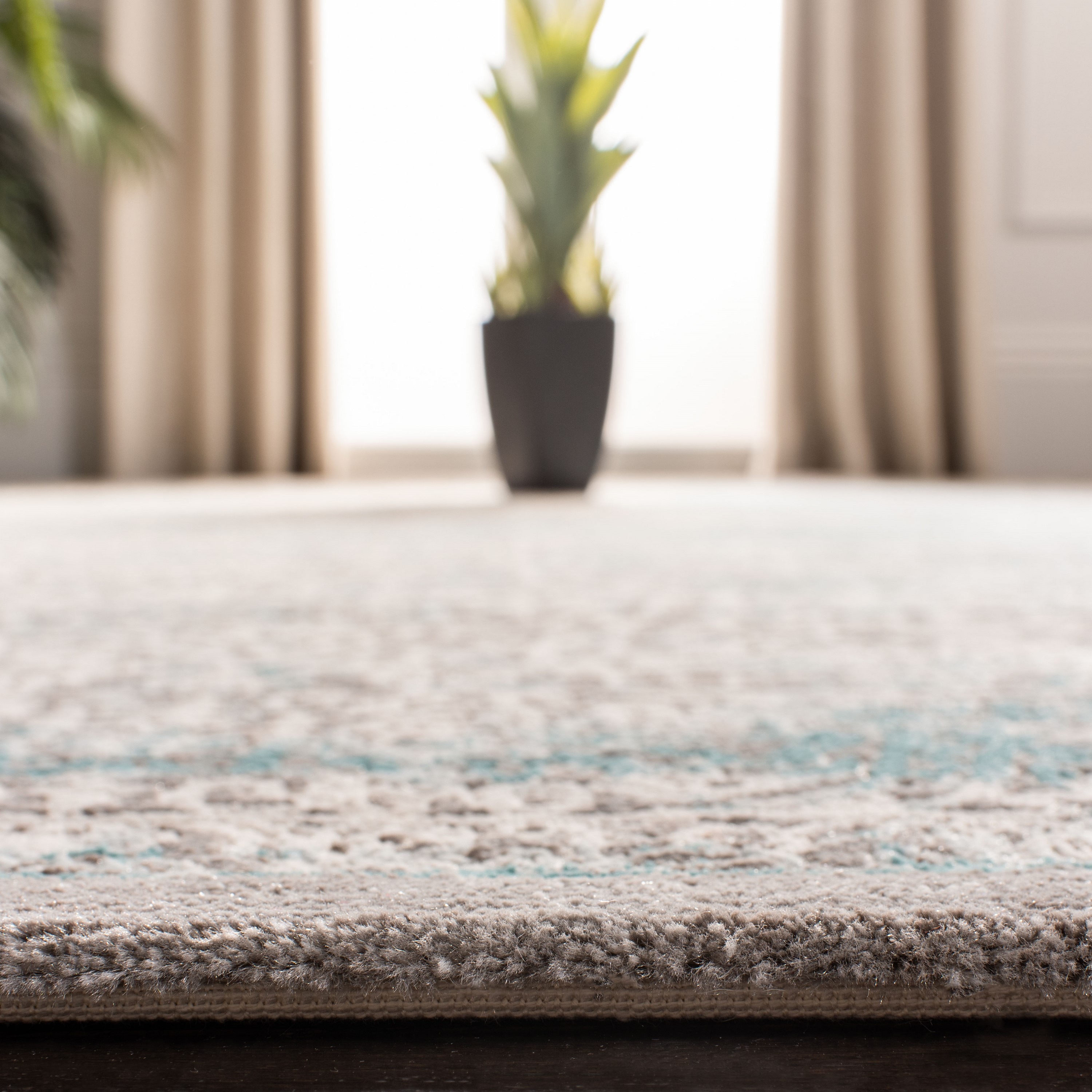 Turquoise and Ivory Synthetic Rectangular Area Rug, 11' x 15'