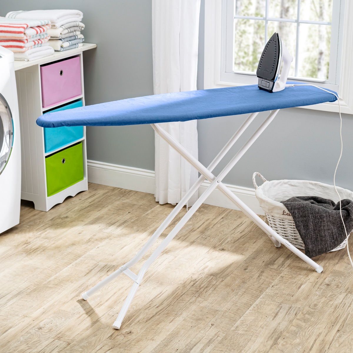 SEYMOUR HOME PRODUCTS Blue Freestanding Folding Ironing Board (53-in x  13-in x 36-in) in the Ironing Boards, Covers & Accessories department at