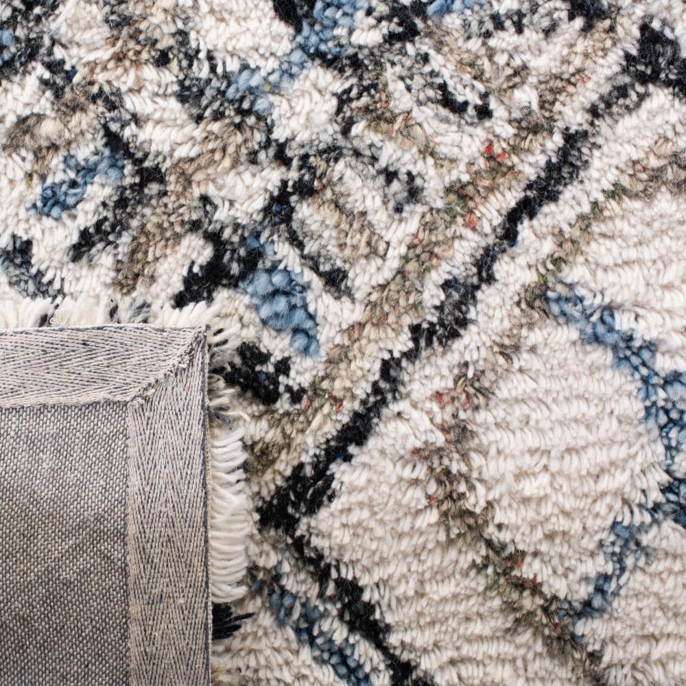 Black and Ivory 4' x 6' Hand-Tufted Wool Shag Rug