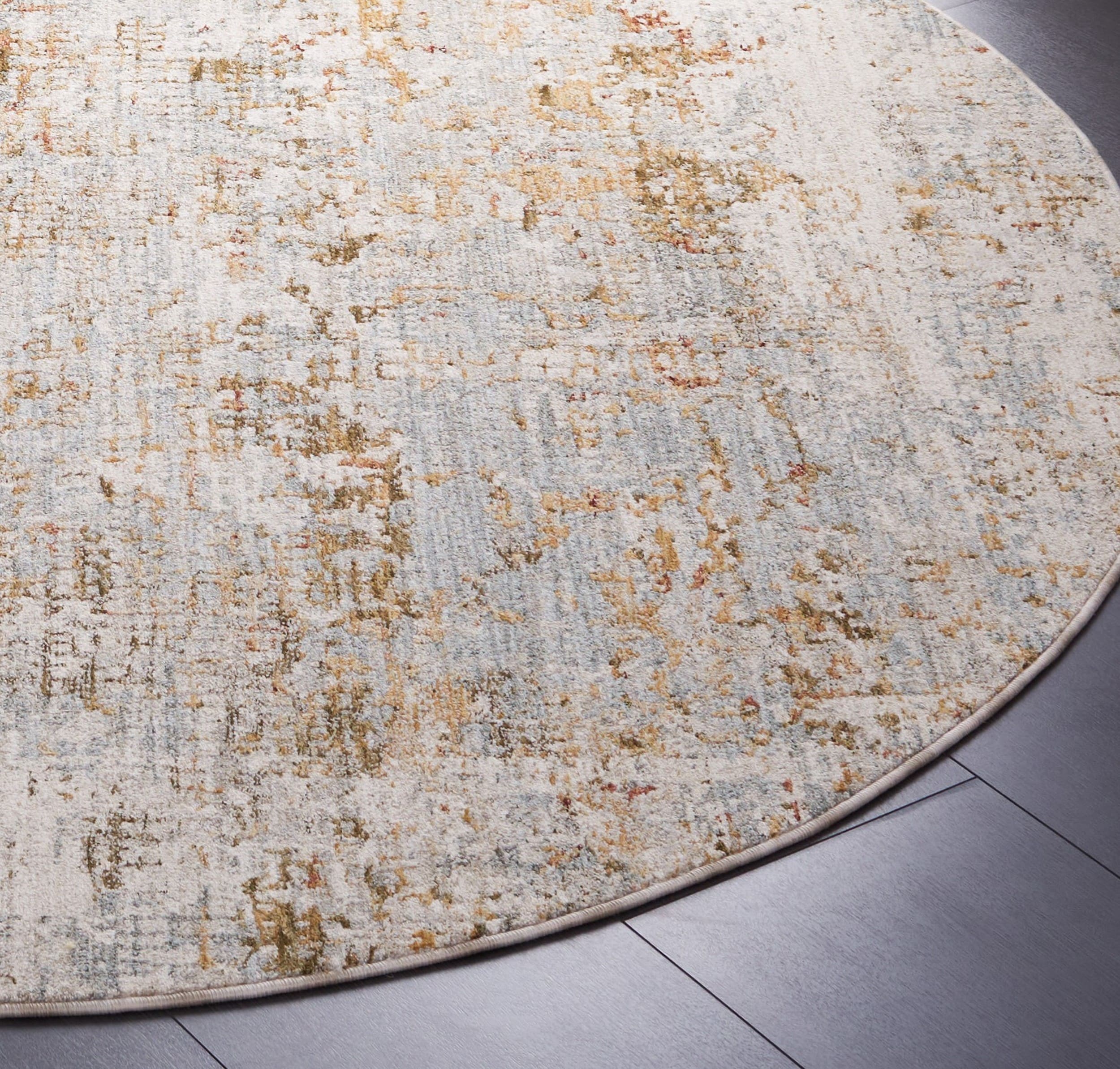 Adrianna Blue and Gold Round Synthetic Area Rug, 6'-7"