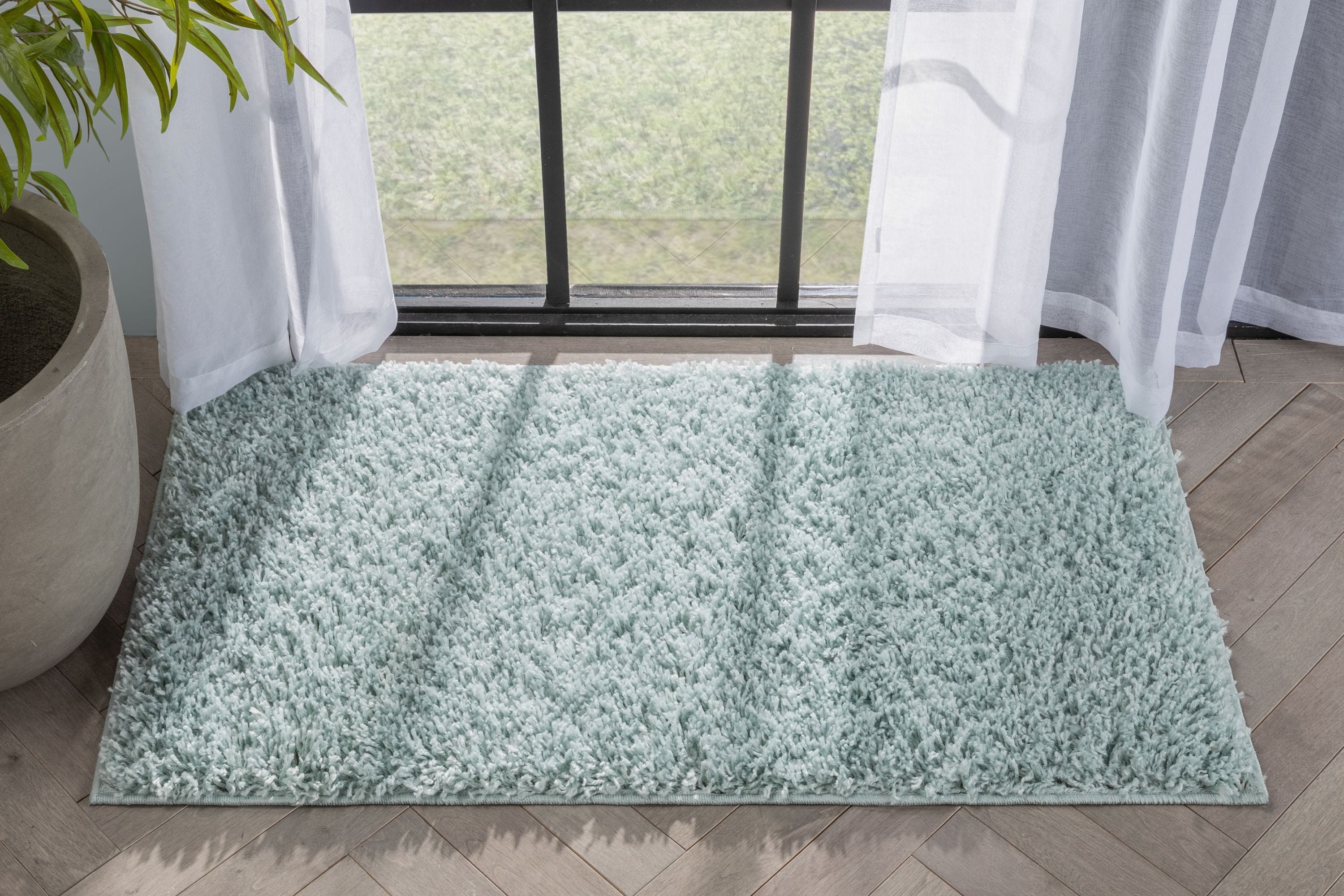 Seafoam Green Solid Shag Reversible Synthetic Area Rug