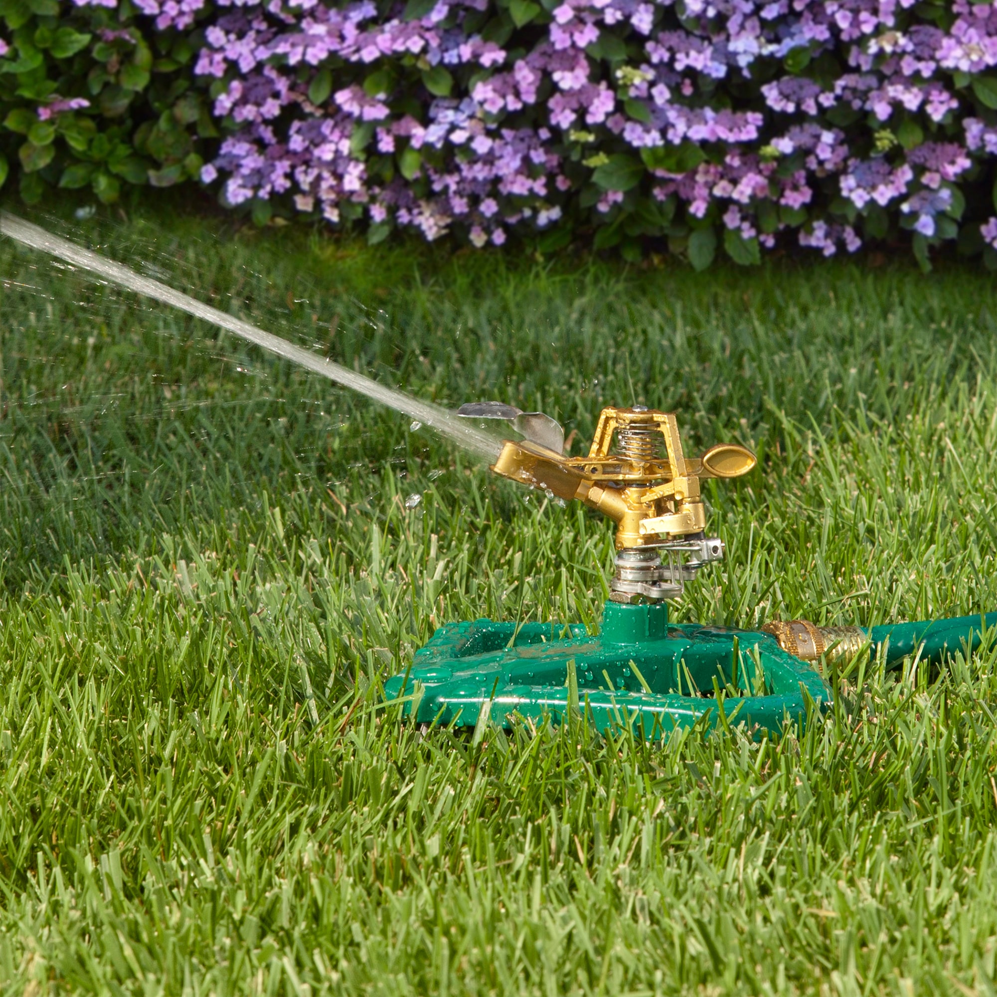 Melnor 5675-sq ft Impulse Sled Lawn Sprinkler in the Lawn