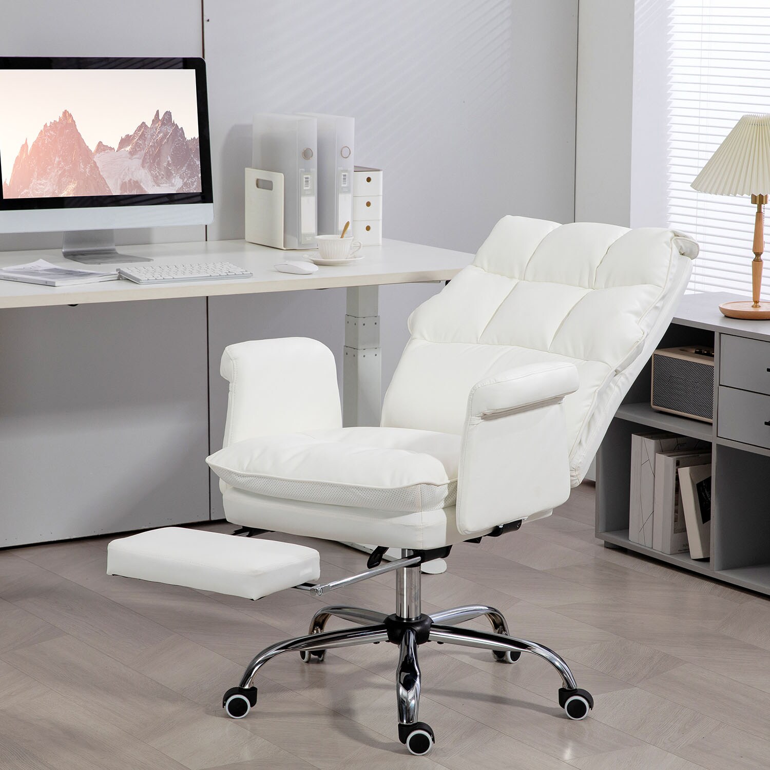White executive swivel chair in an office workspace