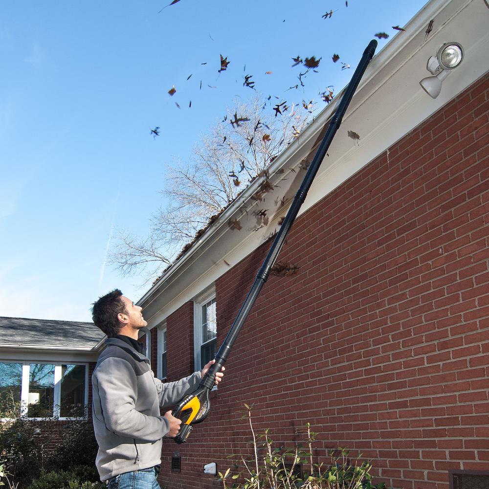 A leaf blower extension kit that lets you keep two feet firmly