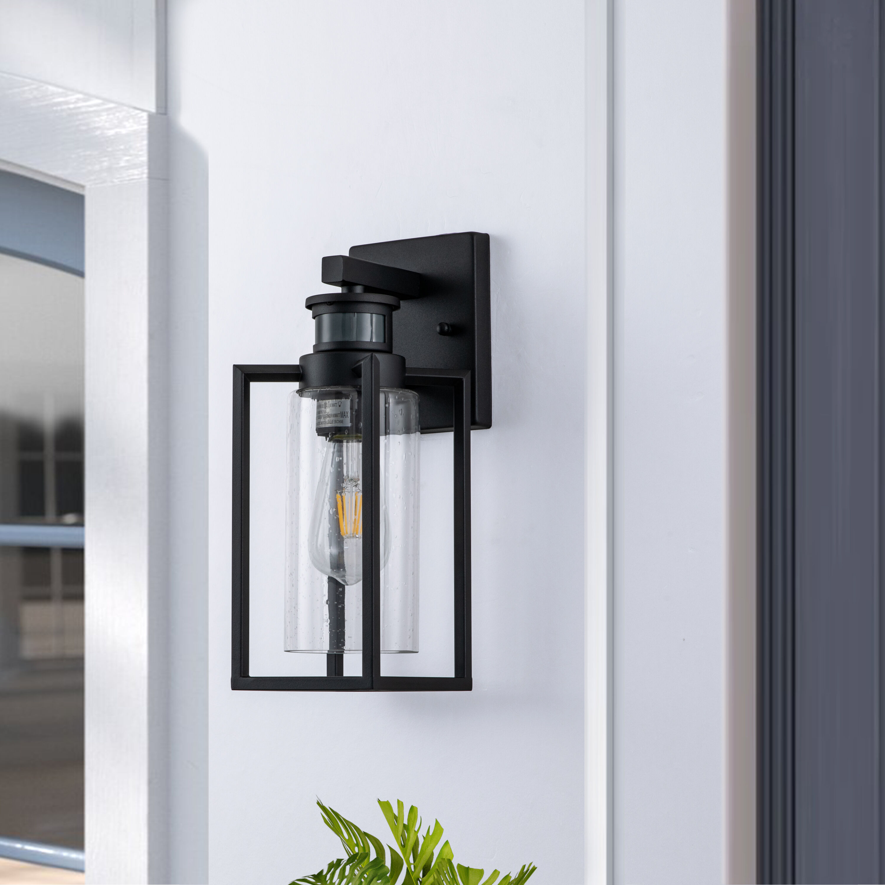 Matte Black Motion Sensor Outdoor Wall Lantern with Clear Glass