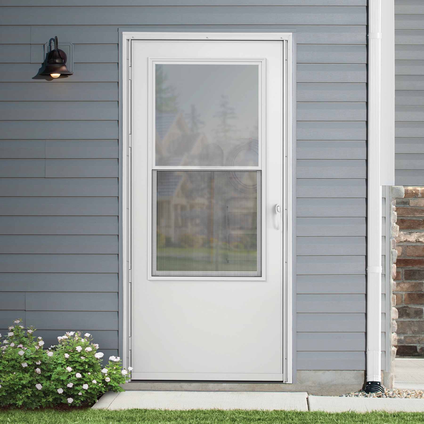 LARSON Bismarck 36-in x 81-in Brown Wood Core Storm Door Mid-view with ...