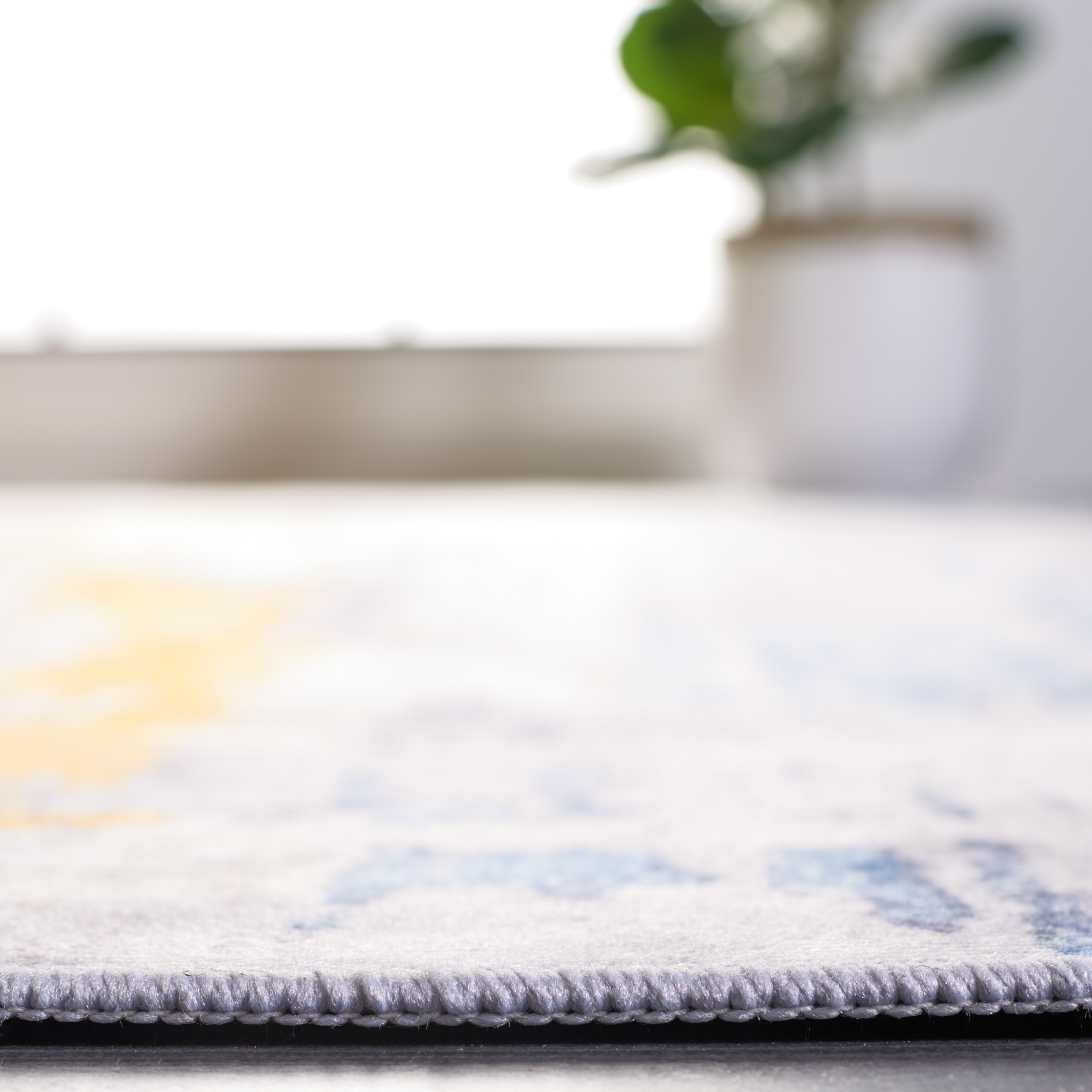 Gray and Blue Abstract Synthetic 4' x 6' Area Rug