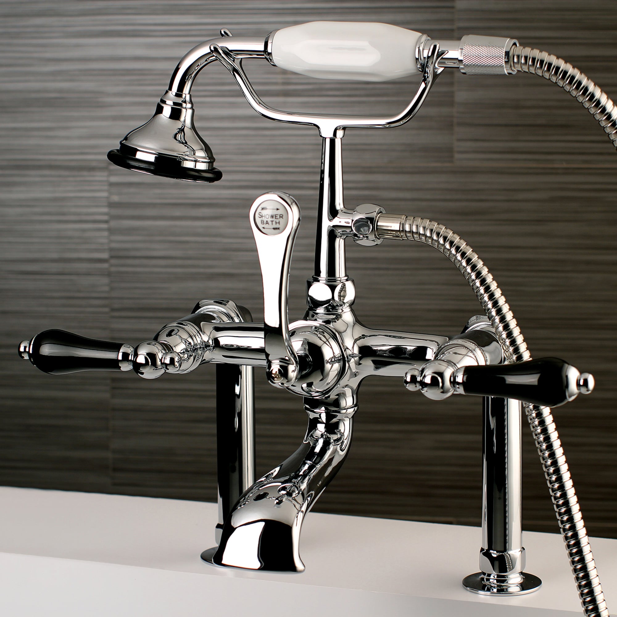 Kingston Brass WLAE104T1PKL Duchess Polished chrome 3-handle Deck-mount Roman Low-arc Bathtub Faucet with Hand Shower ( Valve Included )
