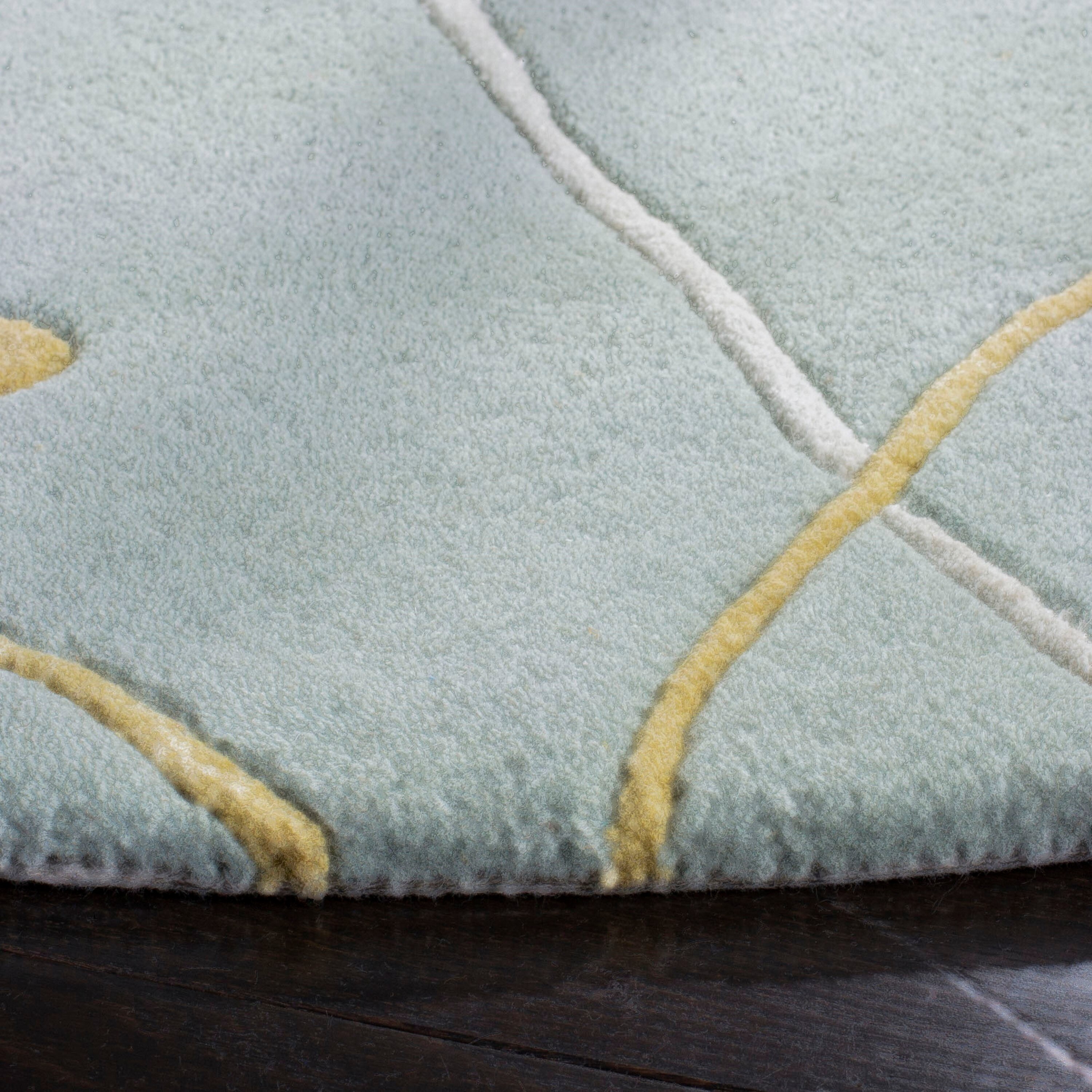 Handmade Light Blue Wool and Viscose Round Tufted Area Rug