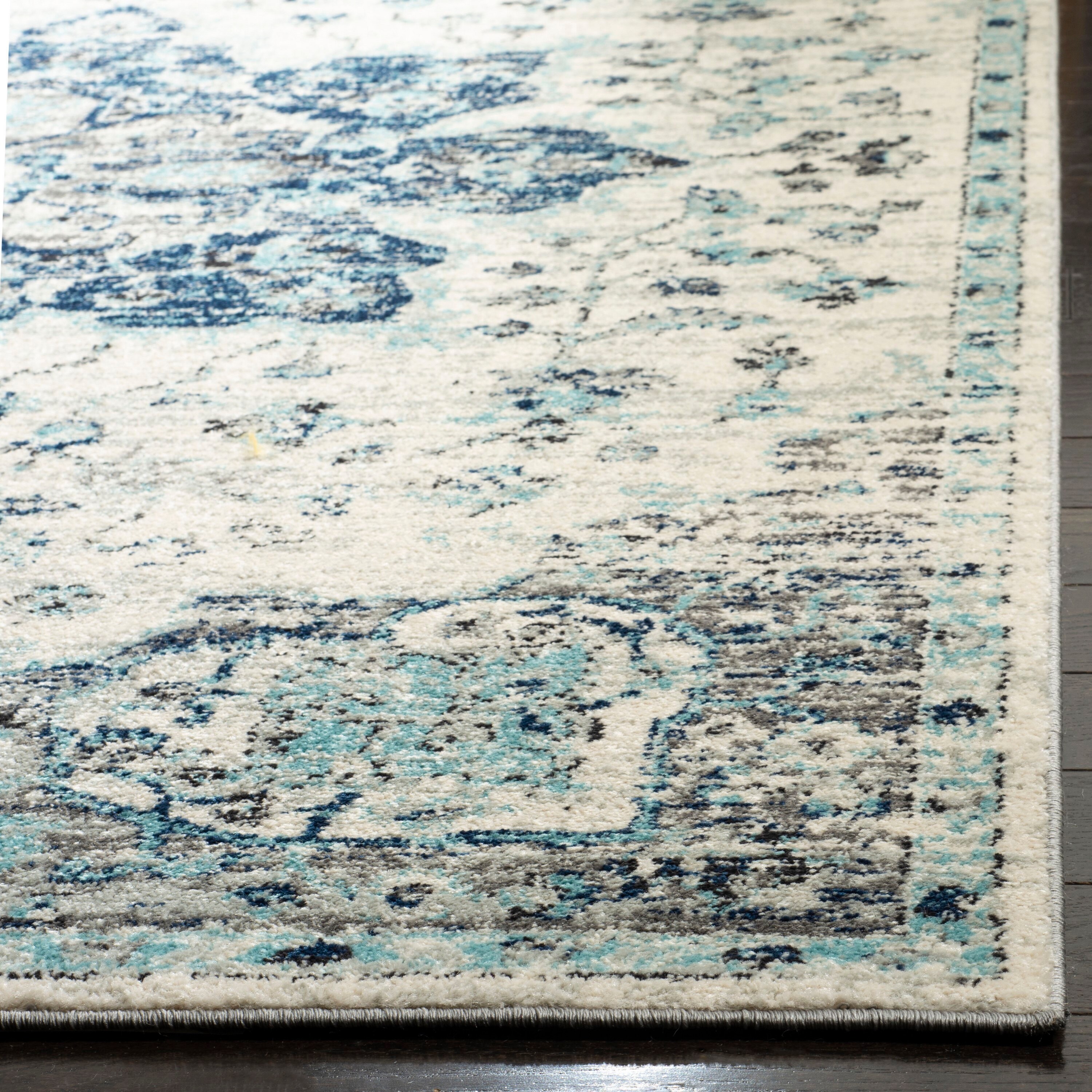 Ivory/Navy Synthetic 4' x 6' Easy-Care Stain-Resistant Area Rug