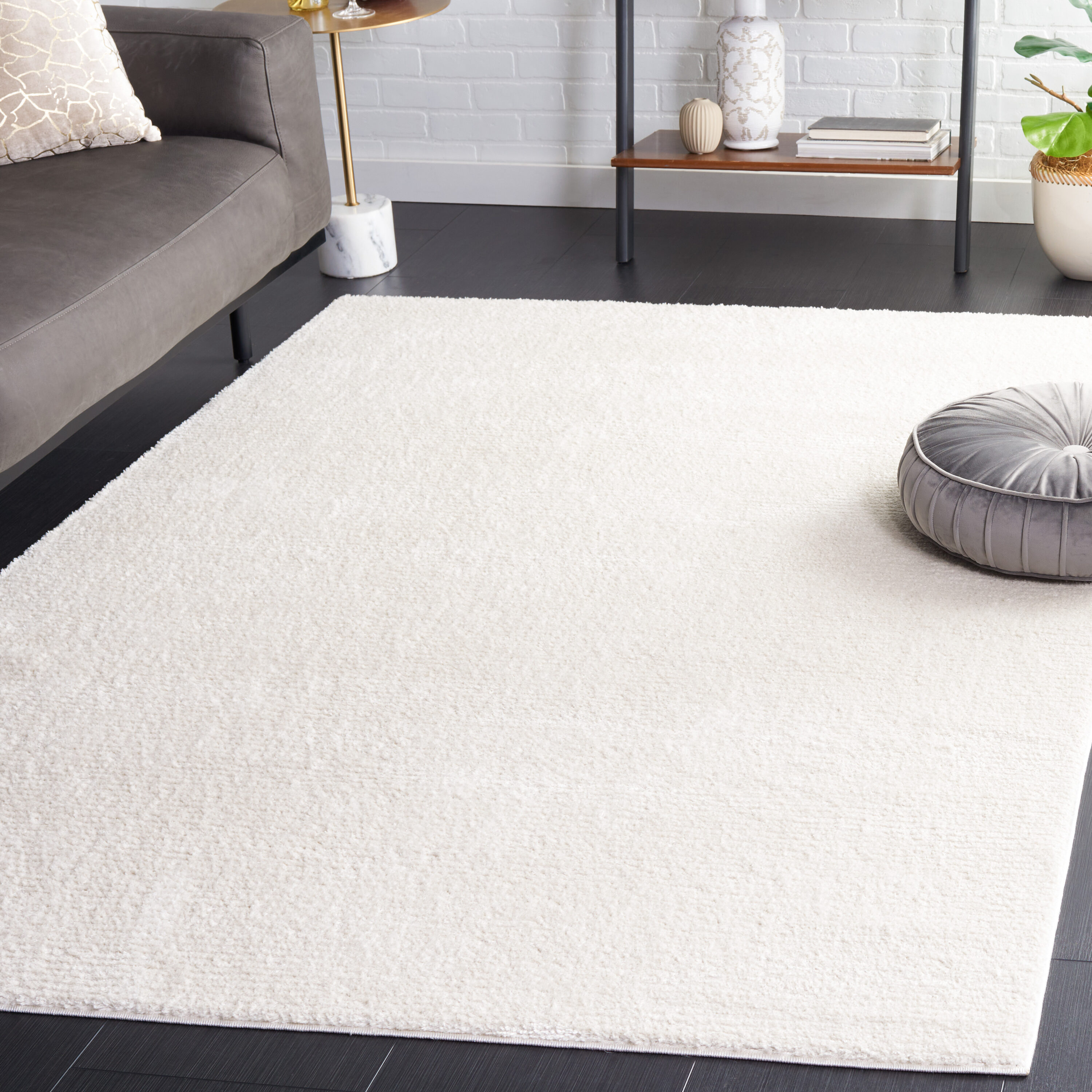 Melody 5 x 8 (ft) Loomed Polyester Ivory Rectangular Indoor Solid Professionally Clean Only Area rug