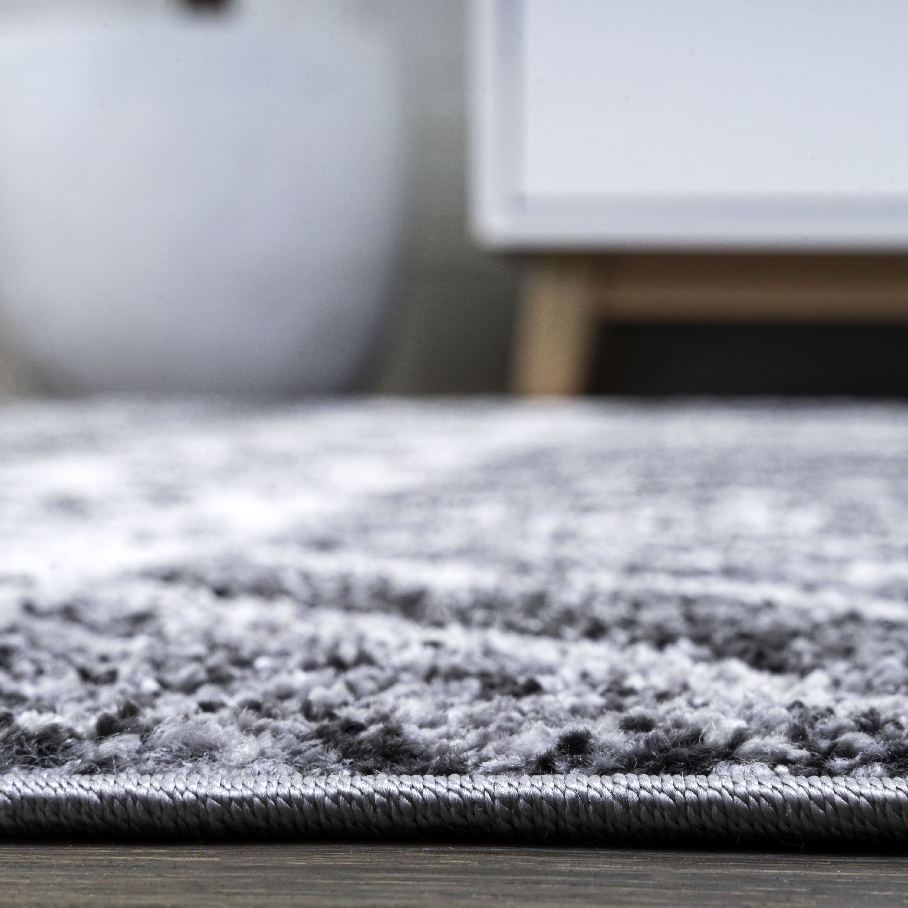 Charcoal and Ivory Distressed Geometric Synthetic Area Rug