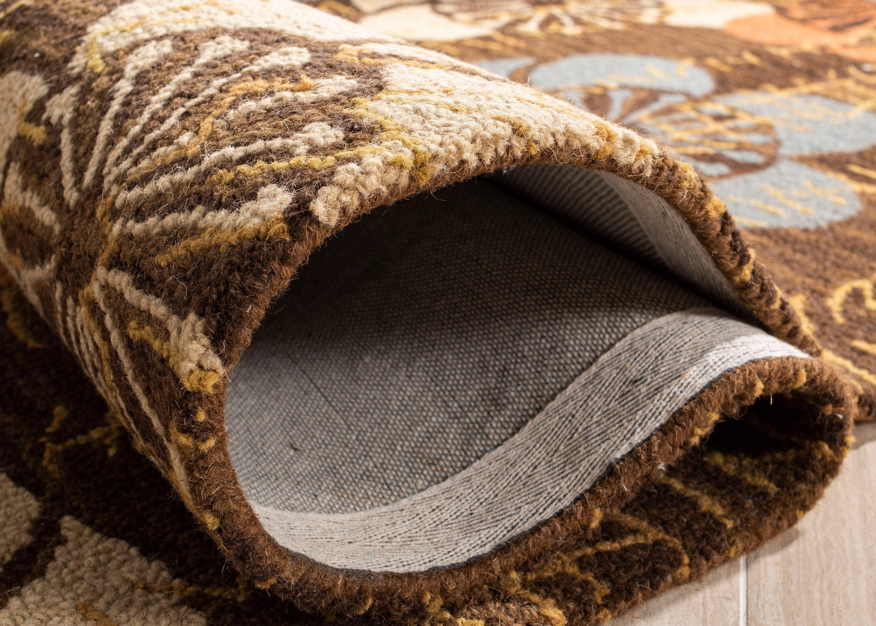 Handmade Tufted Blue and Brown Wool Floral Rug
