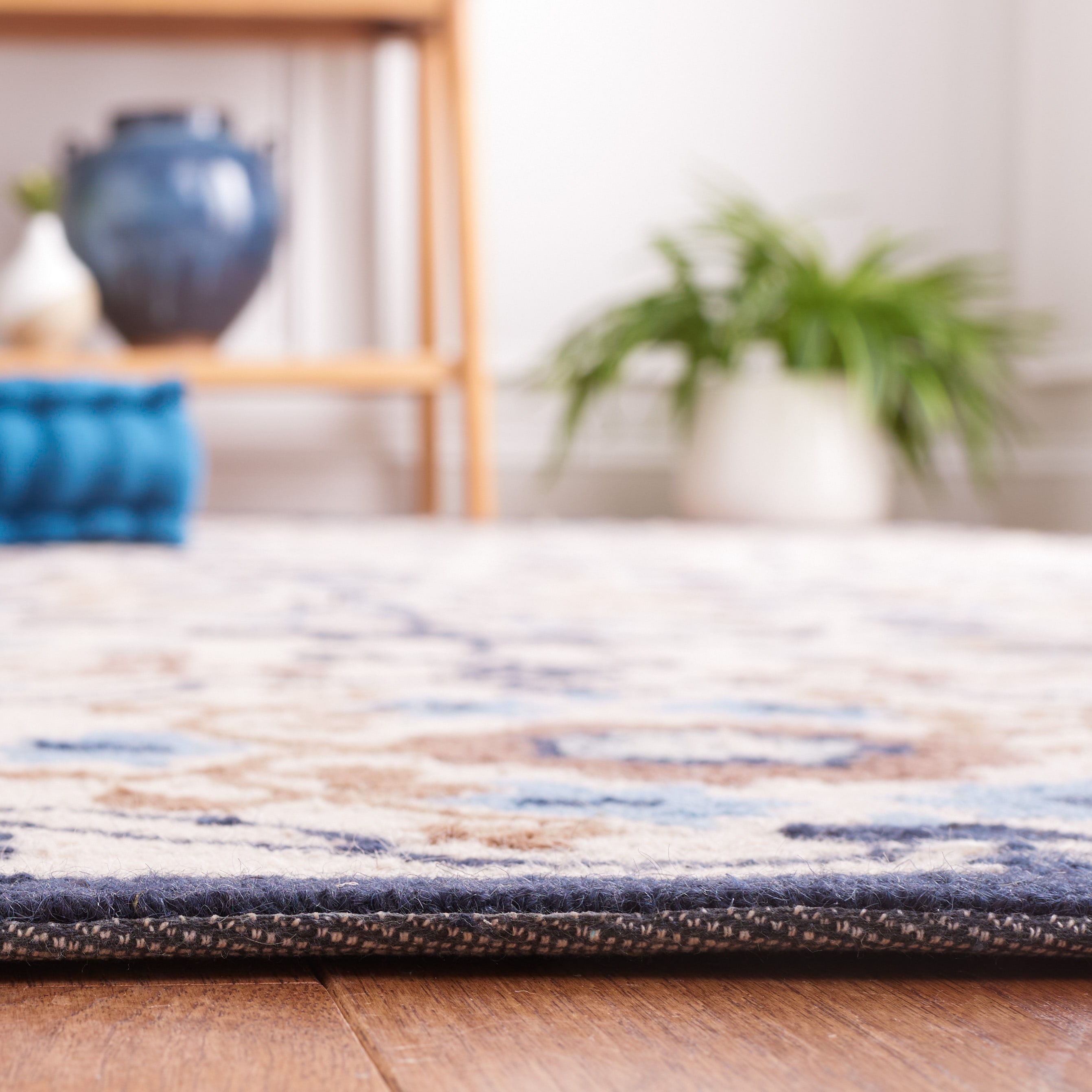 Handmade Ivory and Navy Floral Wool Rectangular Rug 4' x 6'