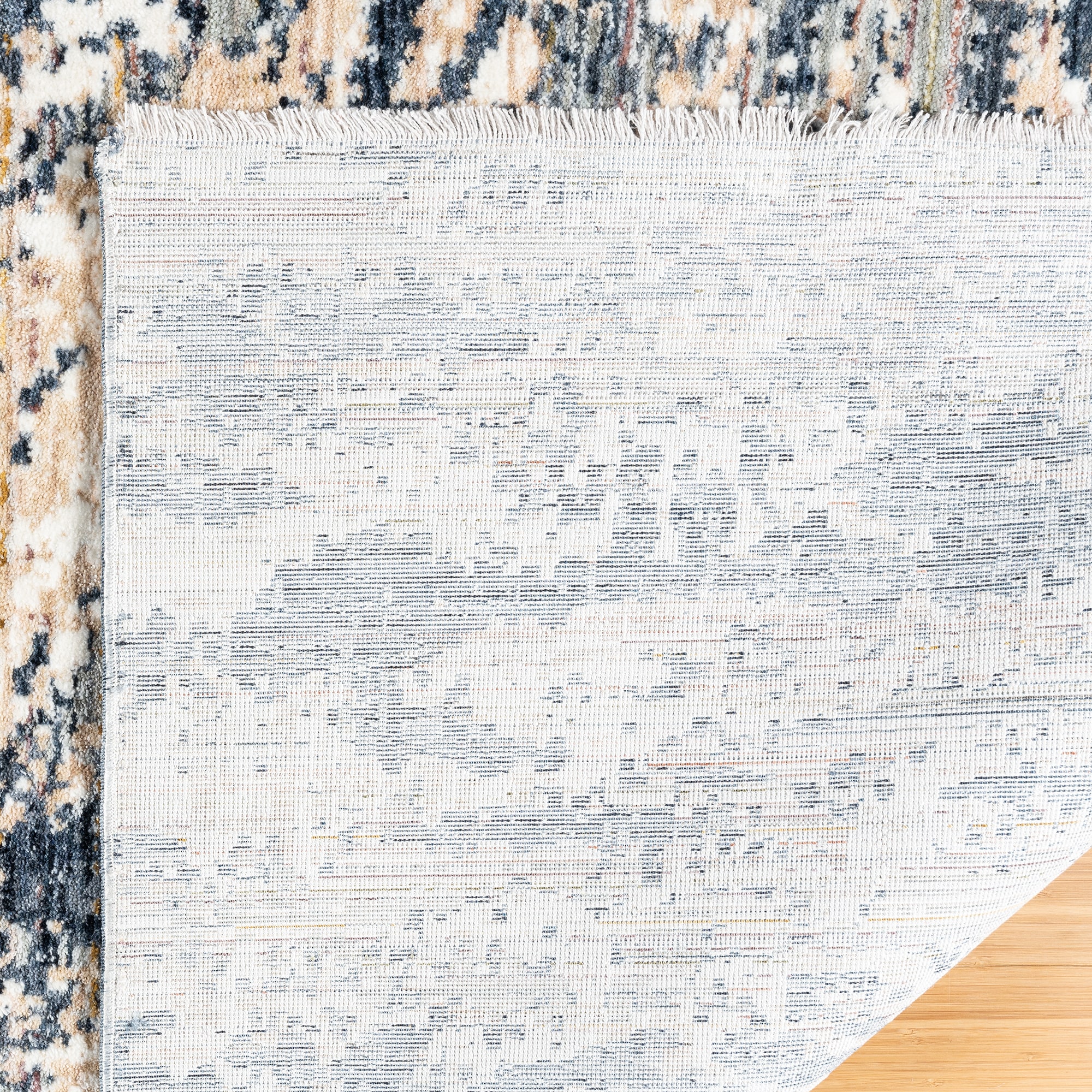 Damita Exton Blue and Beige 6' x 9' Abstract Area Rug