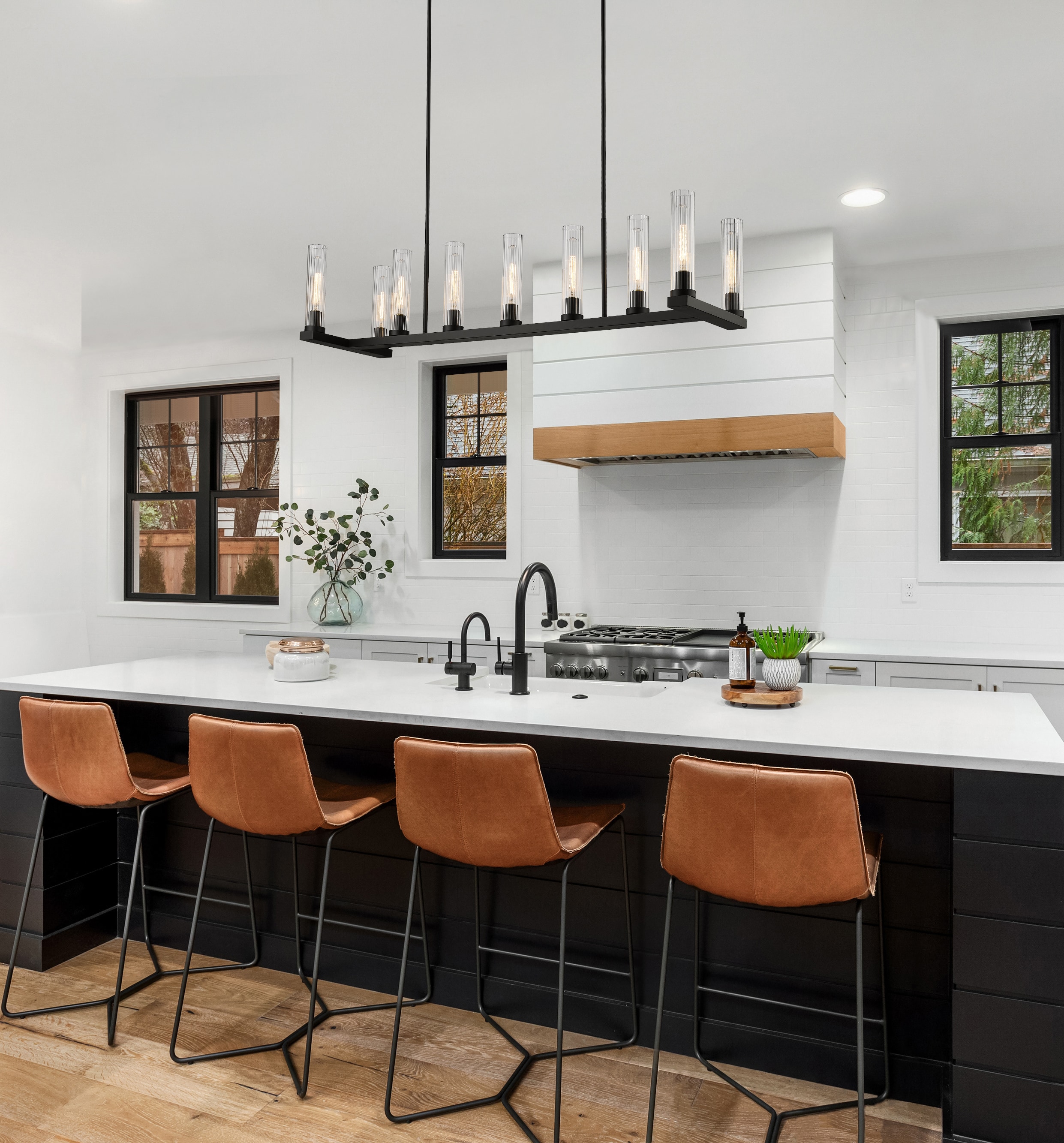 Beau 56" Bronze Steel and Glass 9-Light Linear Chandelier