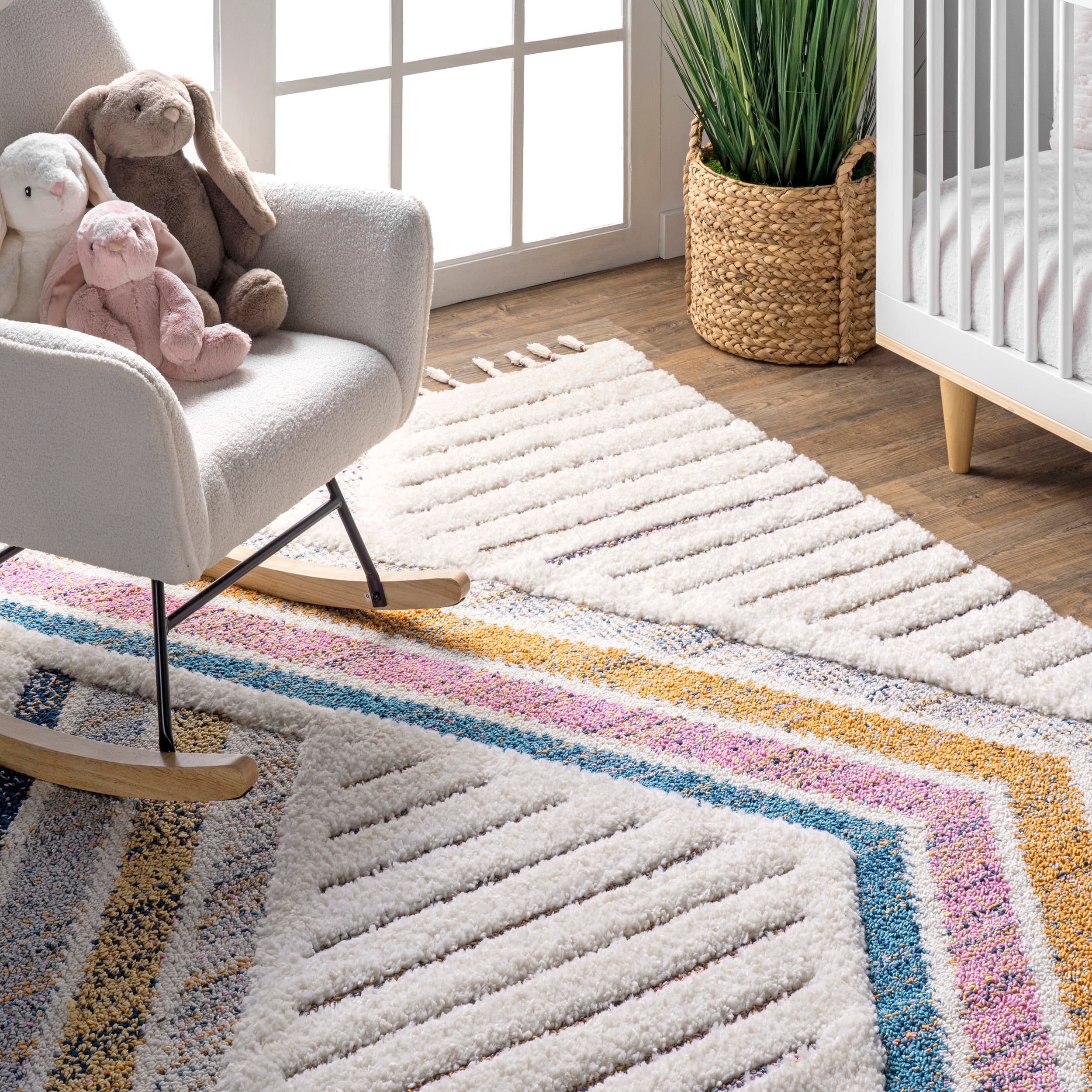 Ivory Geometric Synthetic Rectangular Area Rug with Braided Tassels