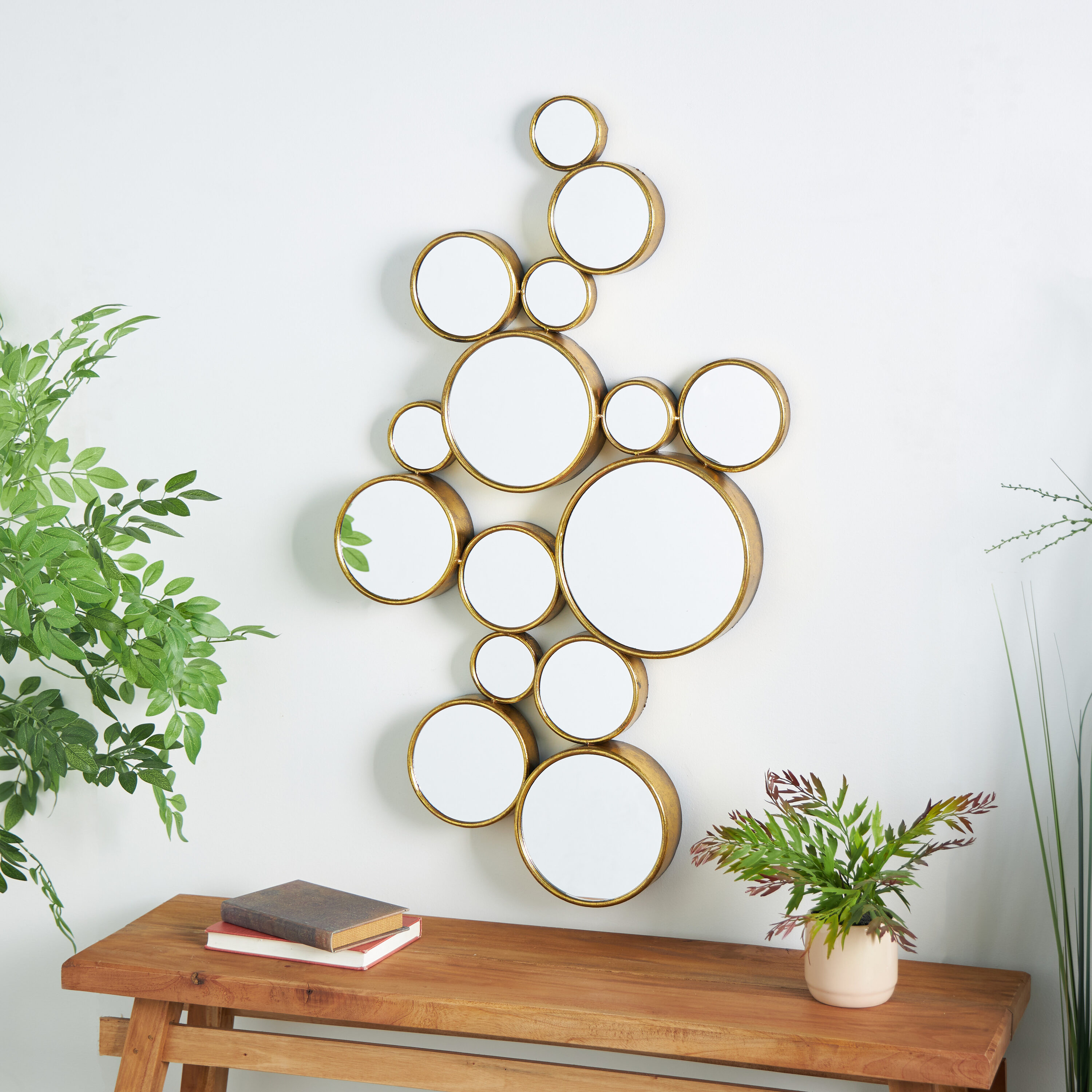 CosmoLiving by Cosmopolitan 93751 22-in W x 40.0-in H Round Gold Bubble Cluster Framed Wall Mirror