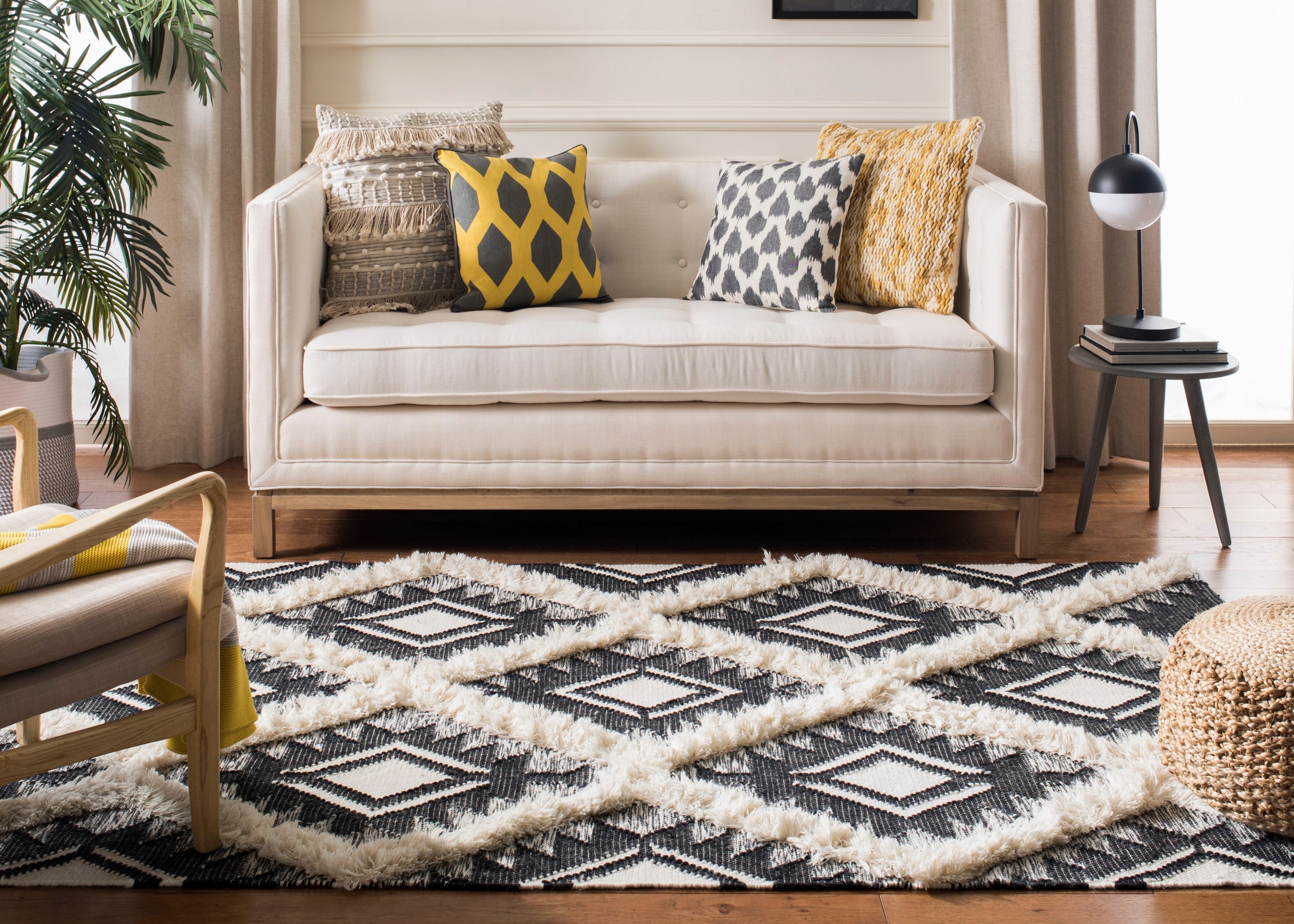 Handwoven Black and Ivory Wool Tribal Area Rug 6' x 9'