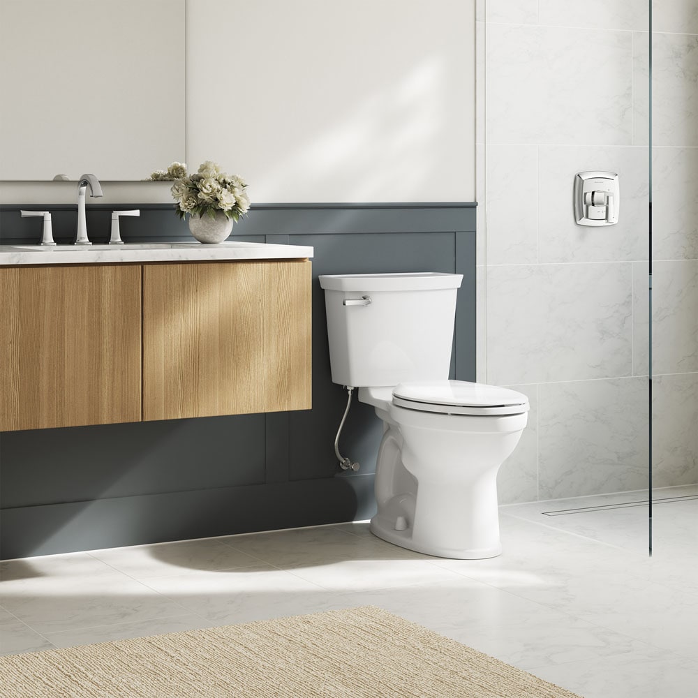 American Standard Champion White Elongated Chair Height 2-piece Soft Close Toilet 12-in Rough-In 1.6-GPF
