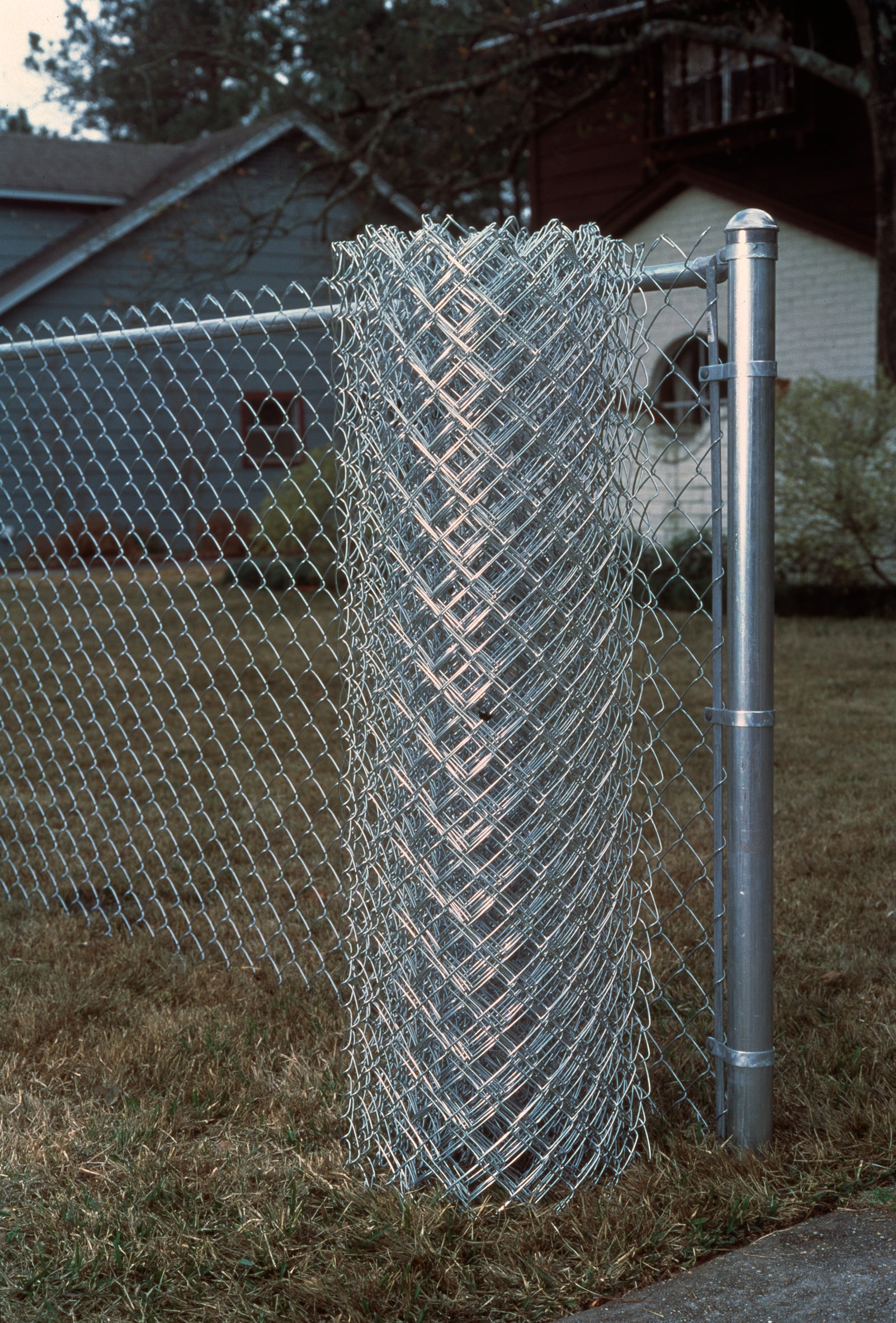 4-ft H x 50-ft W 11.5-Gauge Galvanized Steel Chain Link Fence Fabric with Mesh Size 2.375-in in the Chain Link Fencing department at Lowes