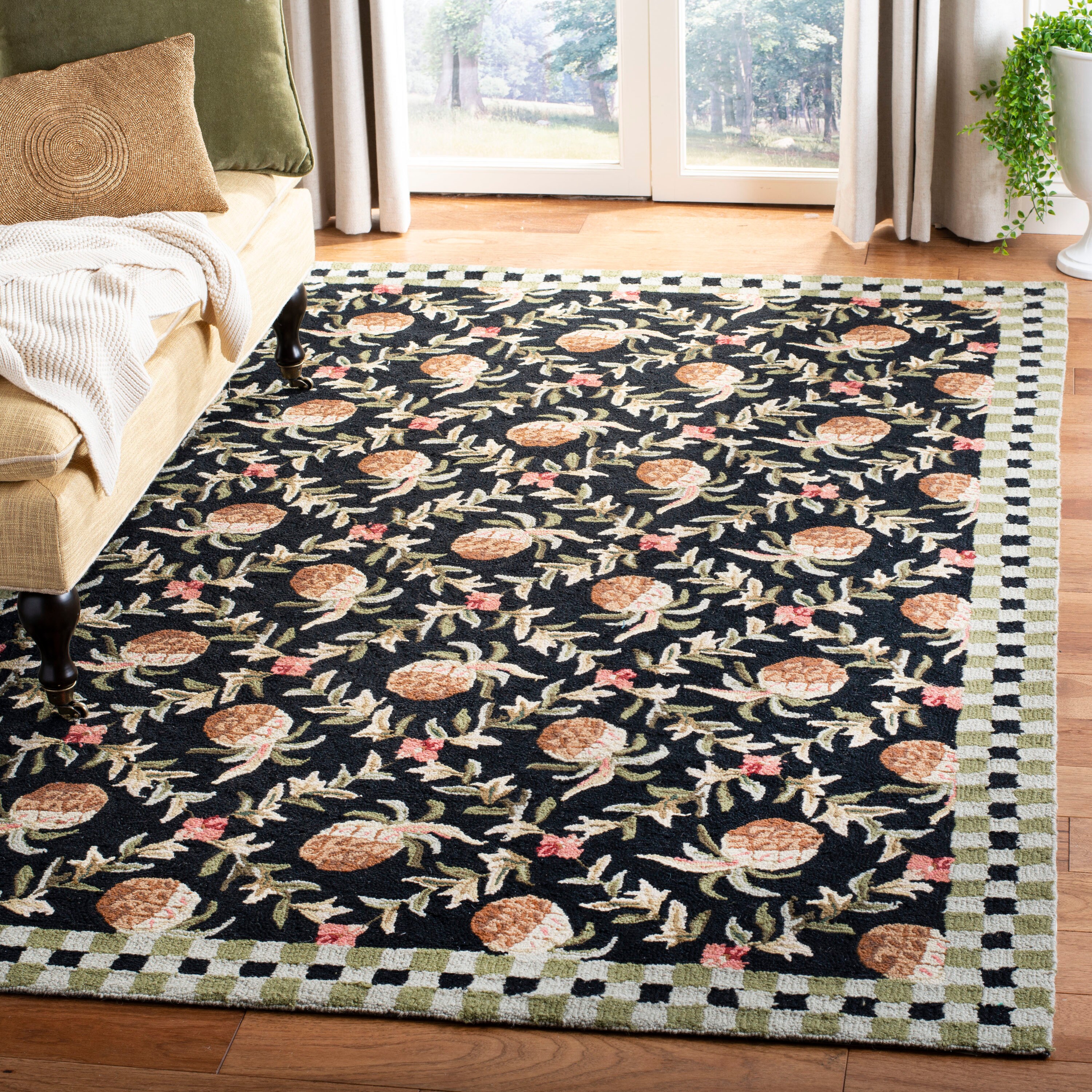 Handmade Ivory and Black Floral Wool Round Area Rug