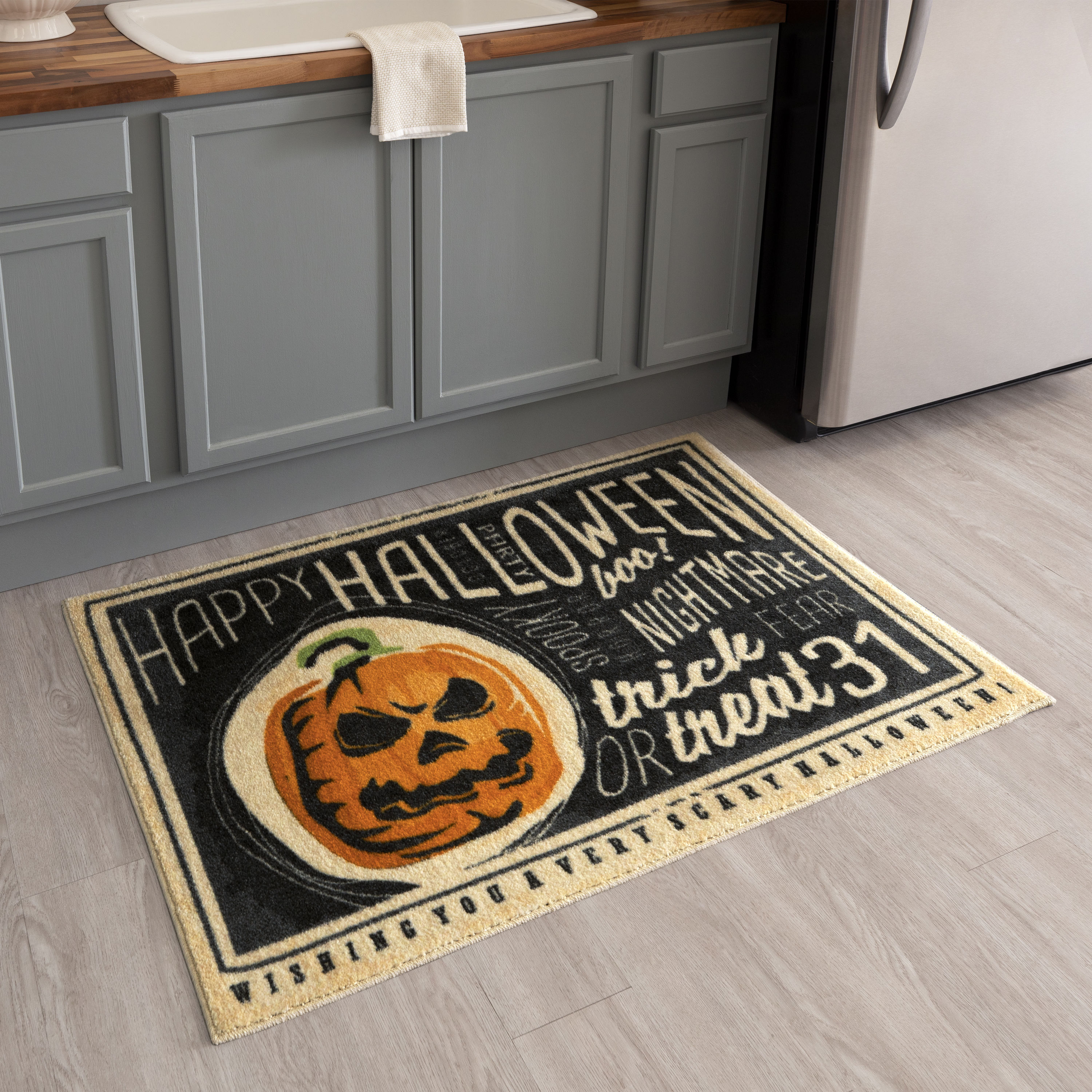 Haunted Living 2-ft x 3-ft Black/Orange/White Rectangular Indoor Door Mat  in the Mats department at