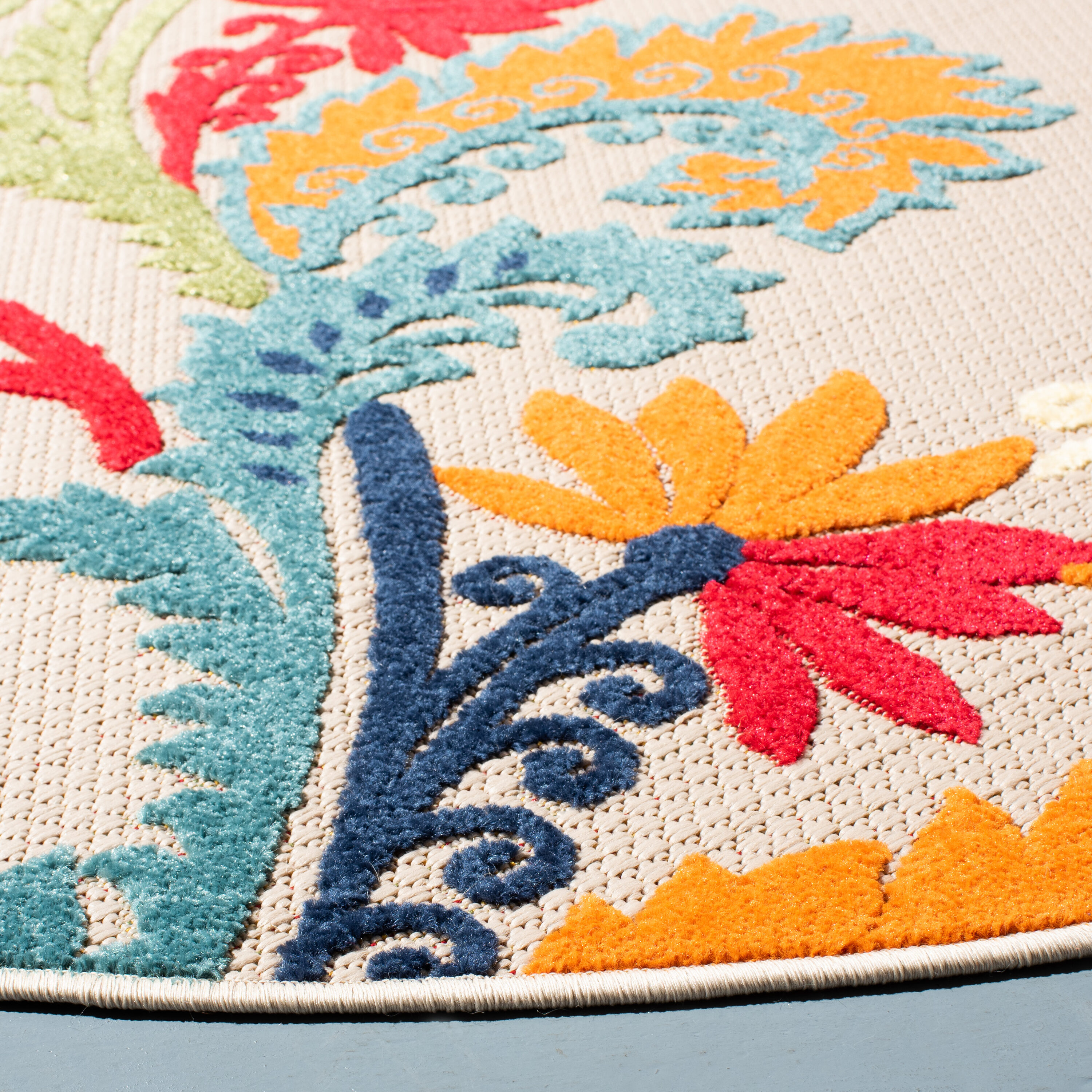 Ivory and Blue Floral Round Reversible Synthetic Rug