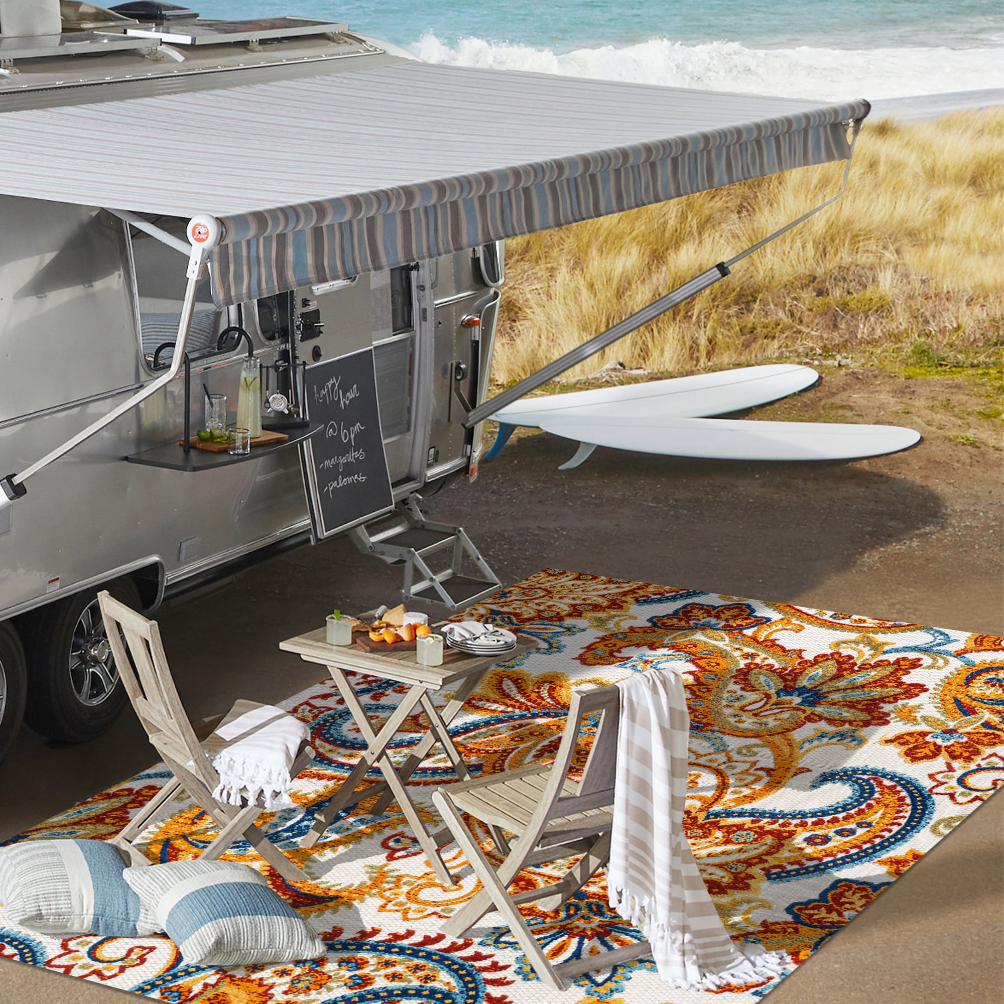 Ivory and Multicolor Paisley High-Low Indoor/Outdoor Rug