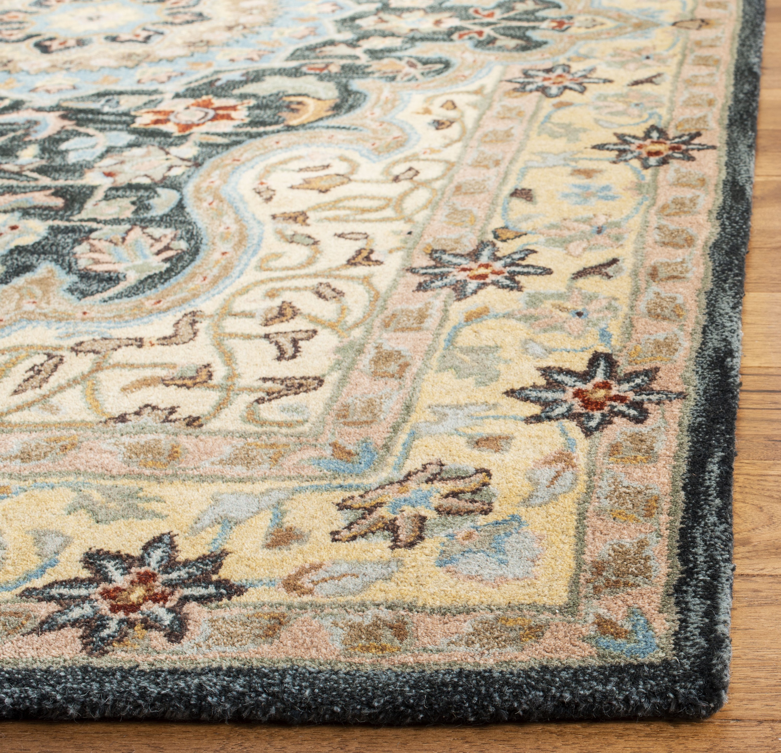 Handmade Black Wool Round Tufted Area Rug