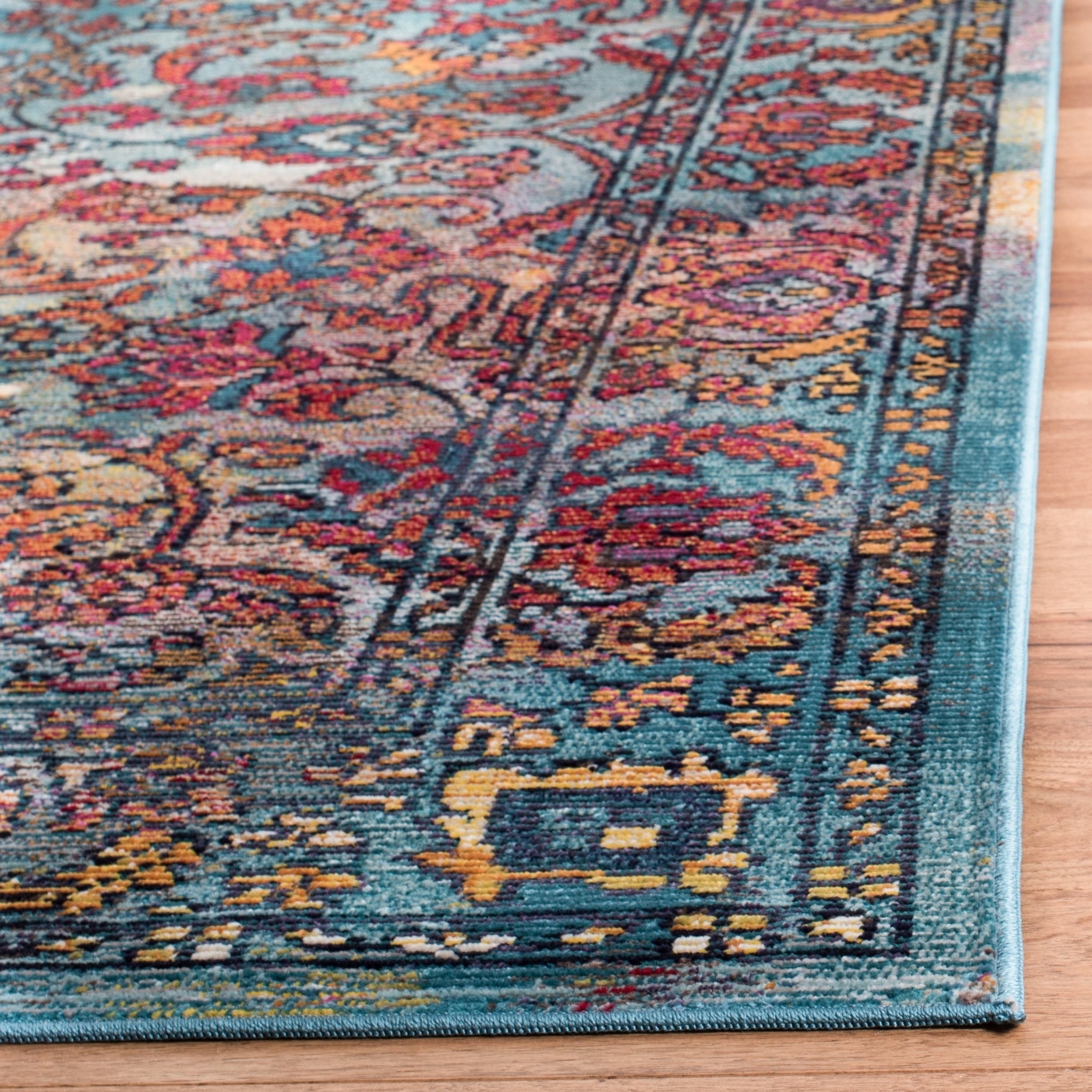 Light Blue and Orange Synthetic Rectangular 4' x 6' Area Rug