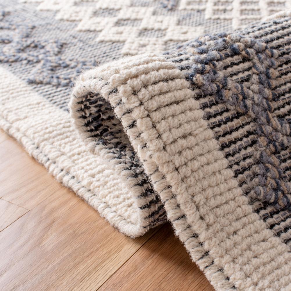 Natura Cream and Navy Handwoven Wool 6' x 9' Area Rug