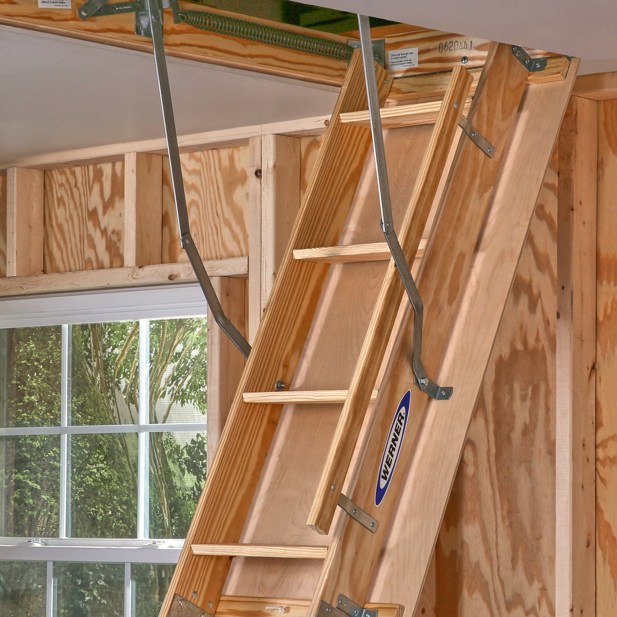 Werner 8.75-ft to 10.25-ft. (Rough Opening: 22.5-in x 54-in) Folding Wood Attic  Ladder with 350 lbs. Capacity at